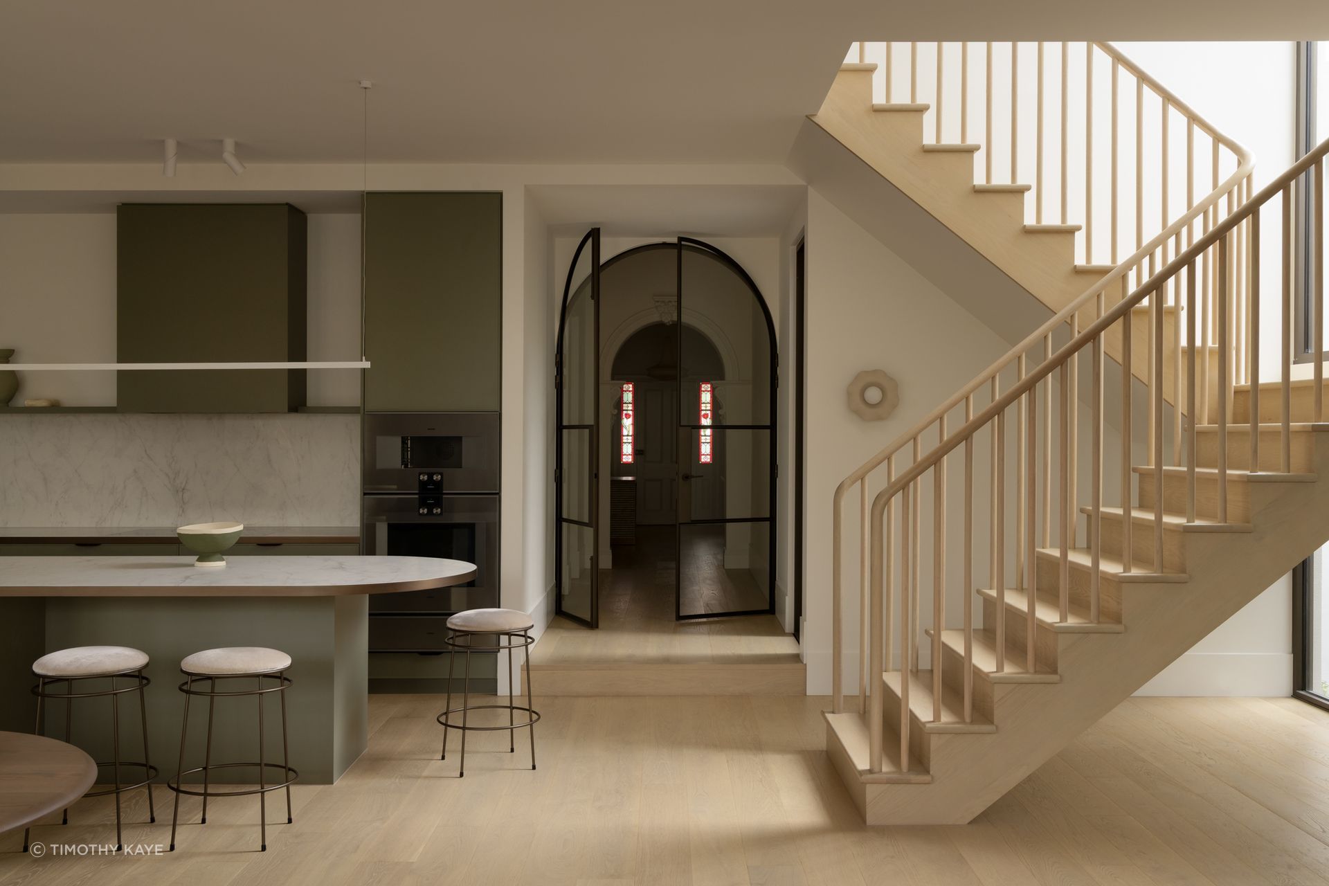 This renovation transformed a brick Victorian cottage into a refined two-storey contemporary residence.