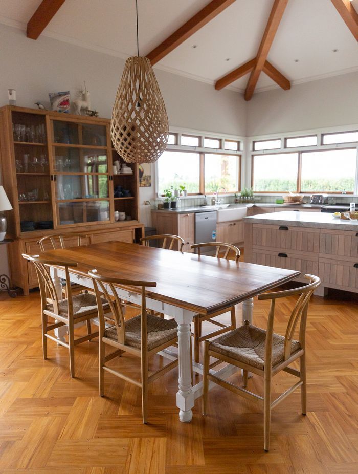A timber kitchen enveloping elegant taste, boasting an incredible parquet floor.