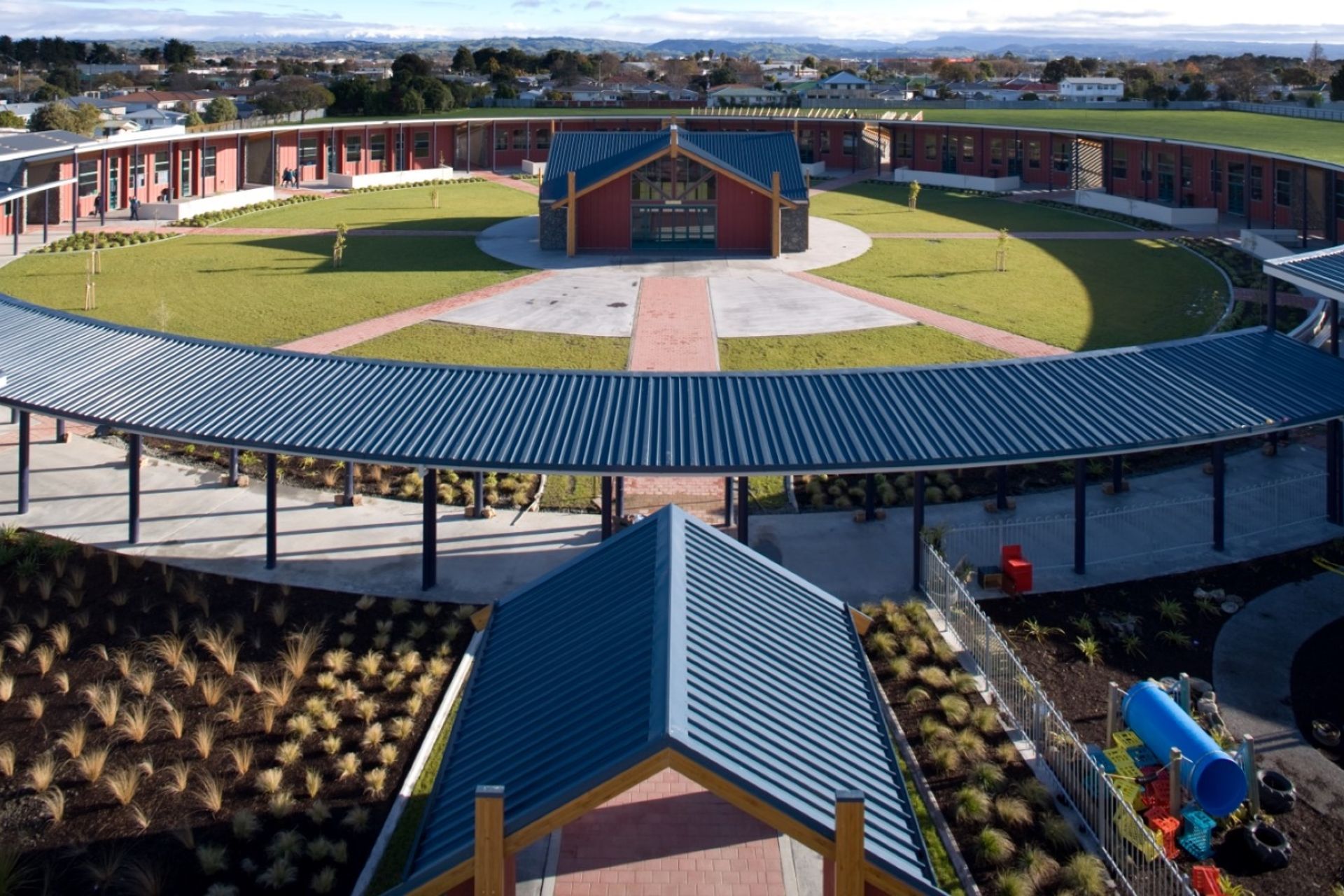 Kliplok Roofing is a high tensile clip fastened trough section option that is perfect for unique roof designs.