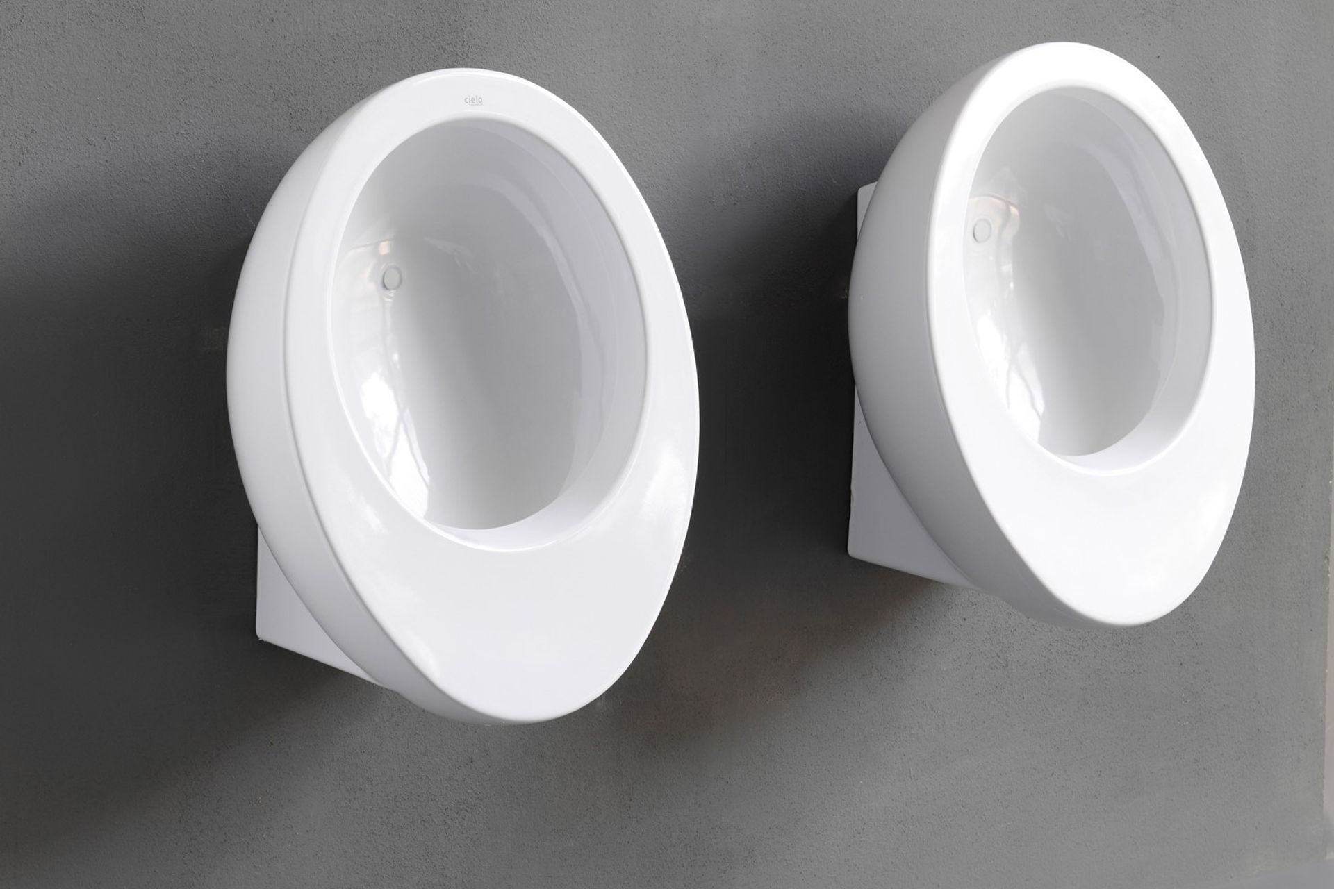 The elegant, sinuous design of the Le Giare Wall Hung Urinal by Cielo shows how stylish these solutions have become.