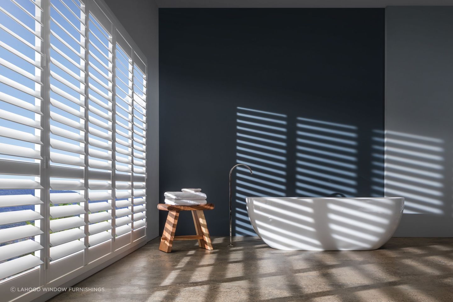Luxaflex PolySatin® Shutters from Lahood Window Furnishings combine traditional styling with modern material finishes.