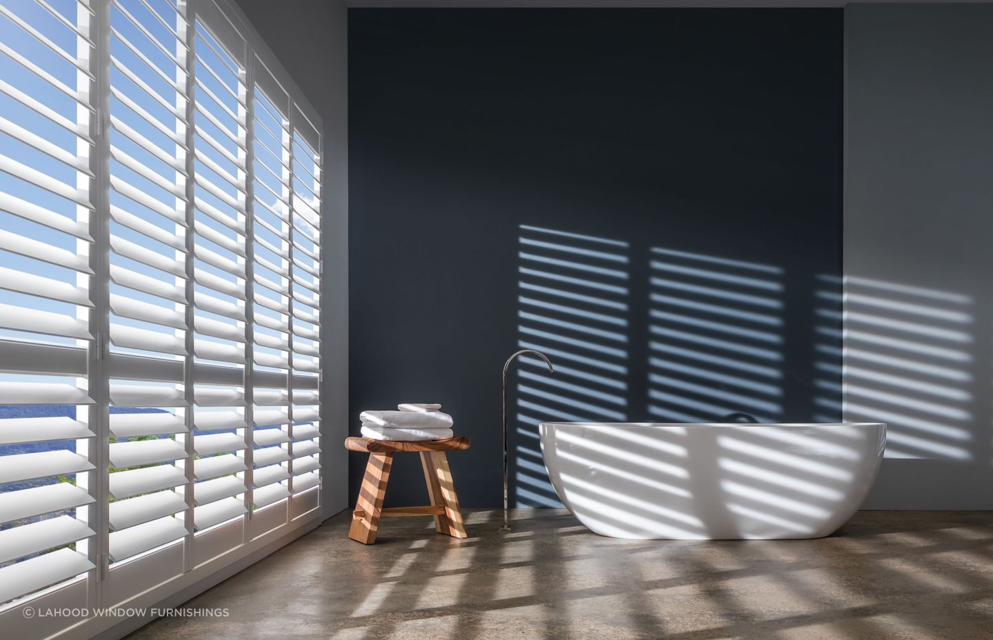Luxaflex PolySatin® Shutters from Lahood Window Furnishings combine traditional styling with modern material finishes.