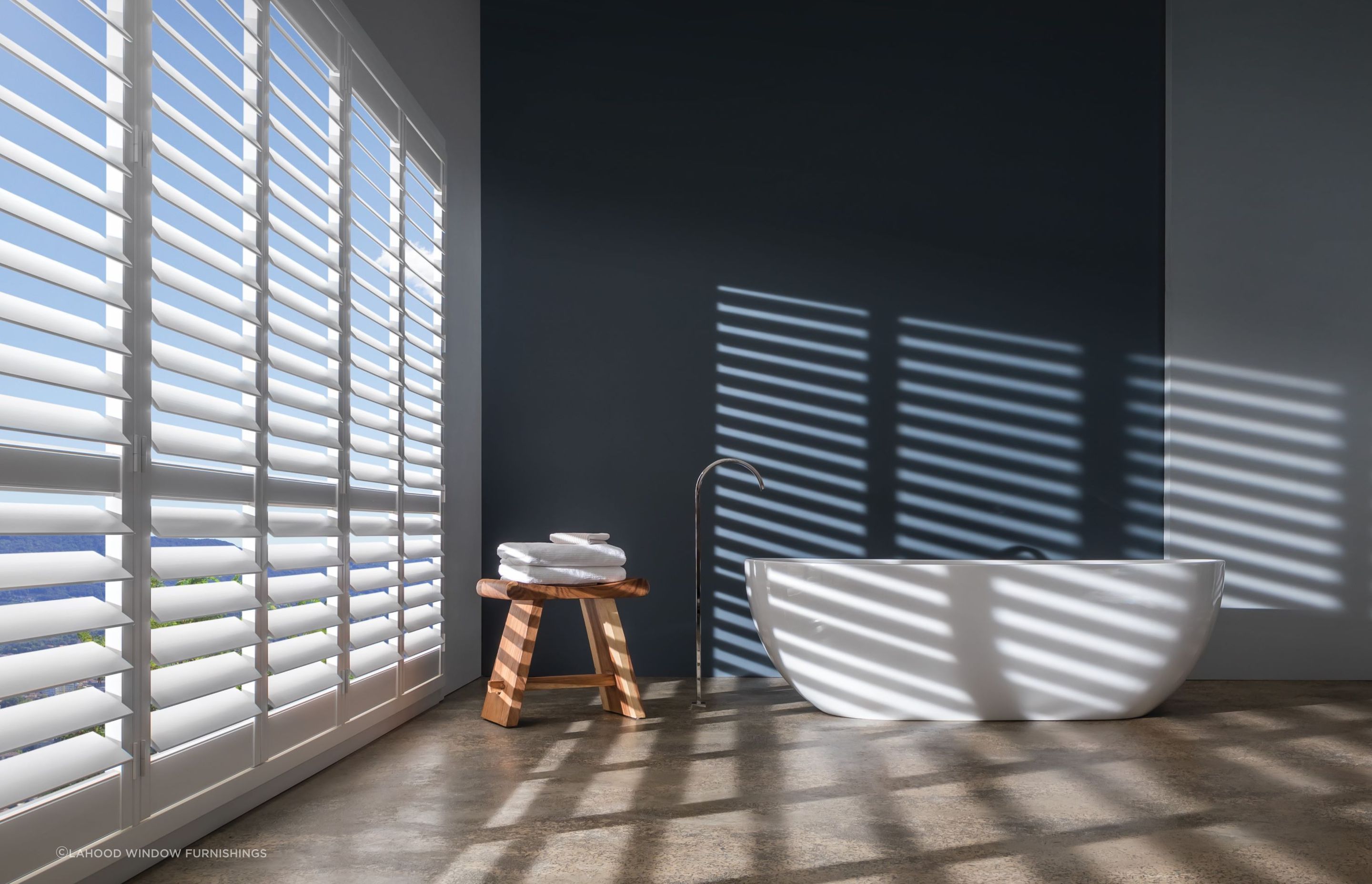 Luxaflex PolySatin® Shutters from Lahood Window Furnishings combine traditional styling with modern material finishes.