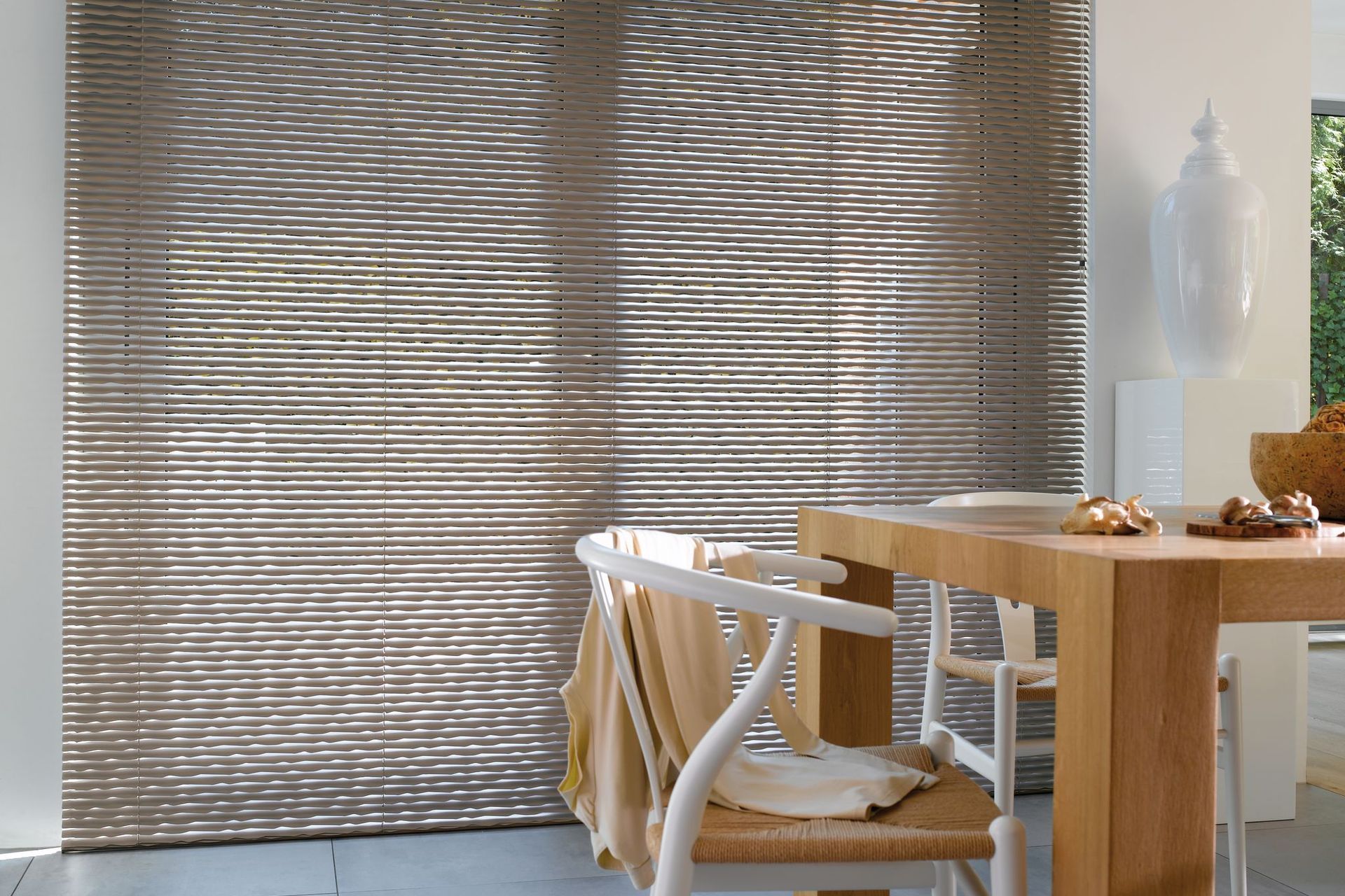 Venetian blinds come in a range of modern materials, as seen here with the LUXAFLEX® Aluminium Venetian Blinds by Guthrie Bowron.