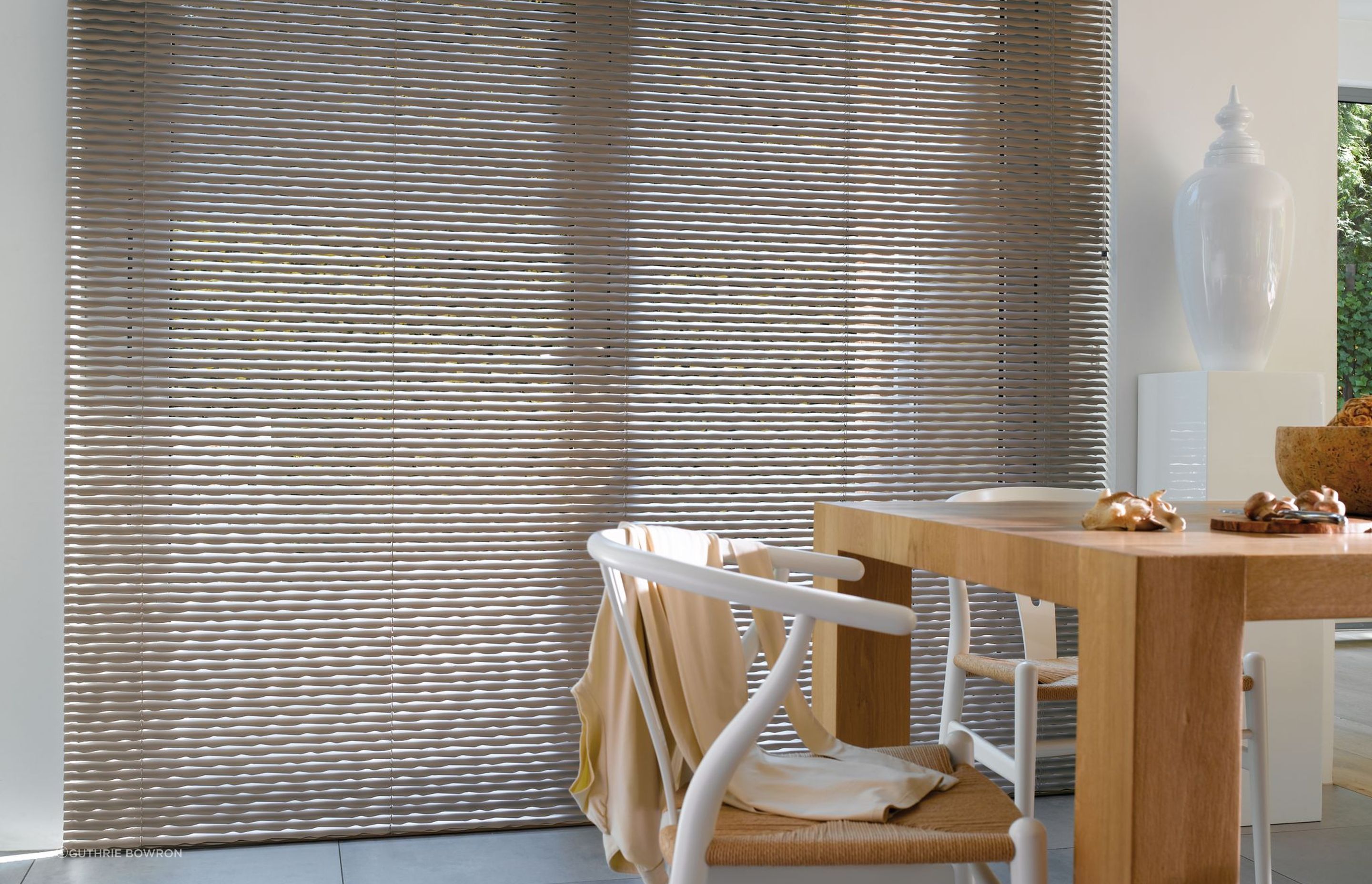 Venetian blinds come in a range of modern materials, as seen here with the LUXAFLEX® Aluminium Venetian Blinds by Guthrie Bowron.