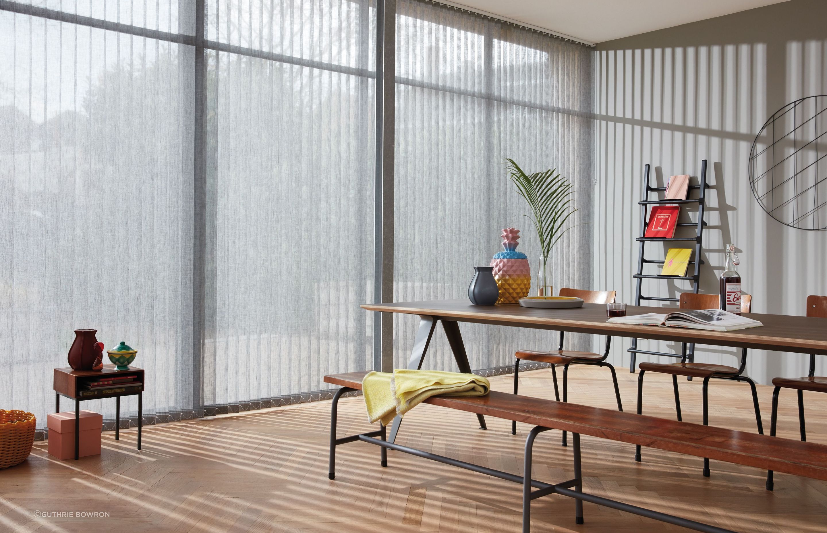These LUXAFLEX® Light Filtering Vertical Blinds by Guthrie Bowron shows how you can infuse style into your space.