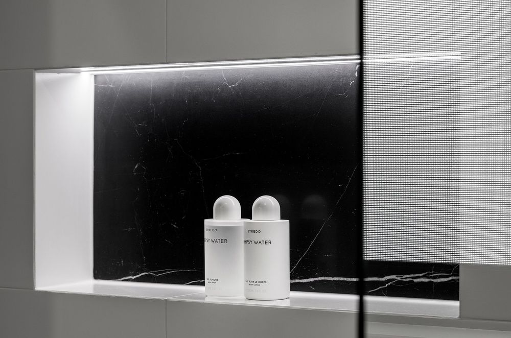 Recessed shelving is lit up from undercabinet lighting in
Huntriss Project - Ensuite
By Lux Interiors for convenience