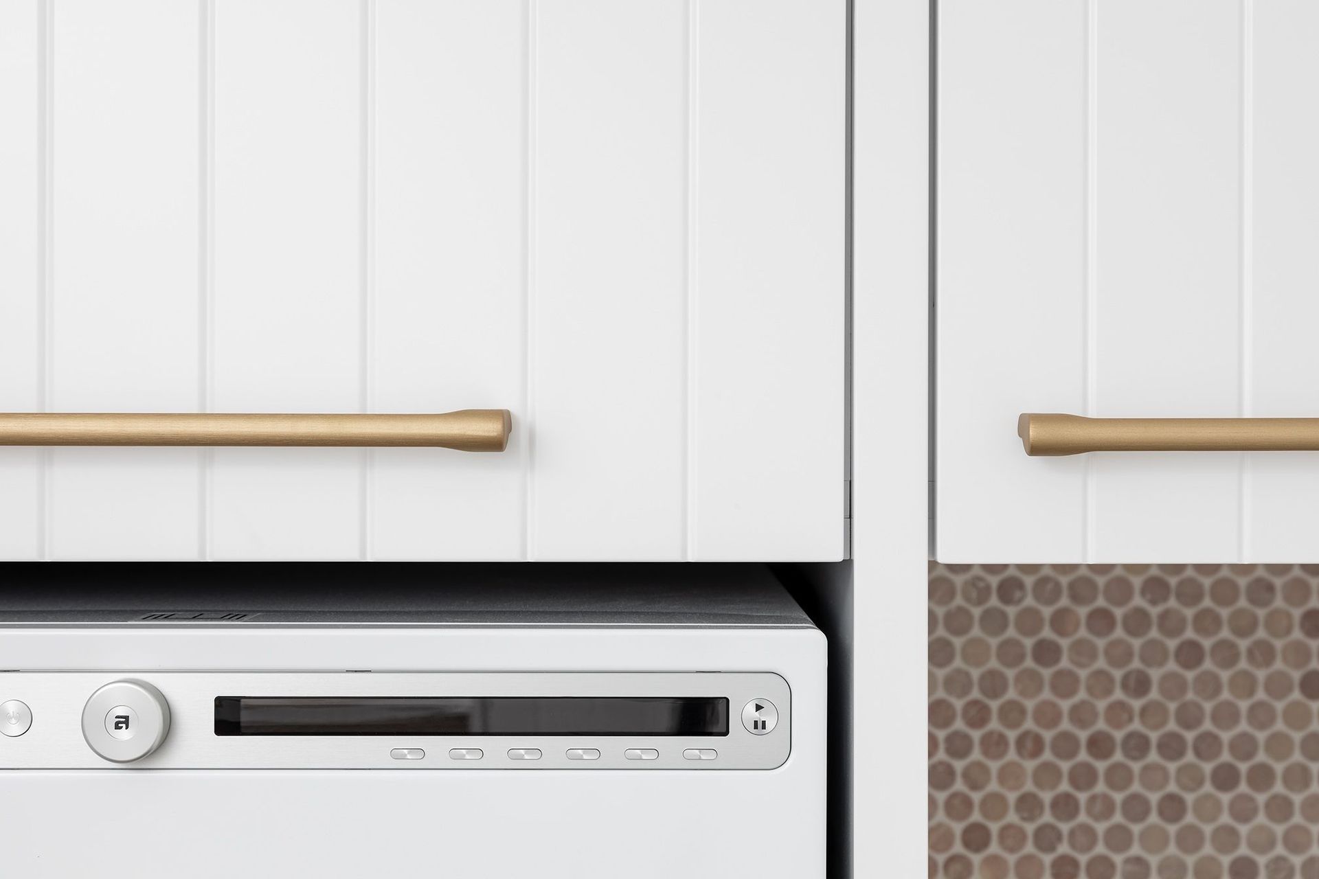 Most modern washing machines have advanced but intuitive controls for ease of use, seen here in the Sholl Project by Lux Interiors.