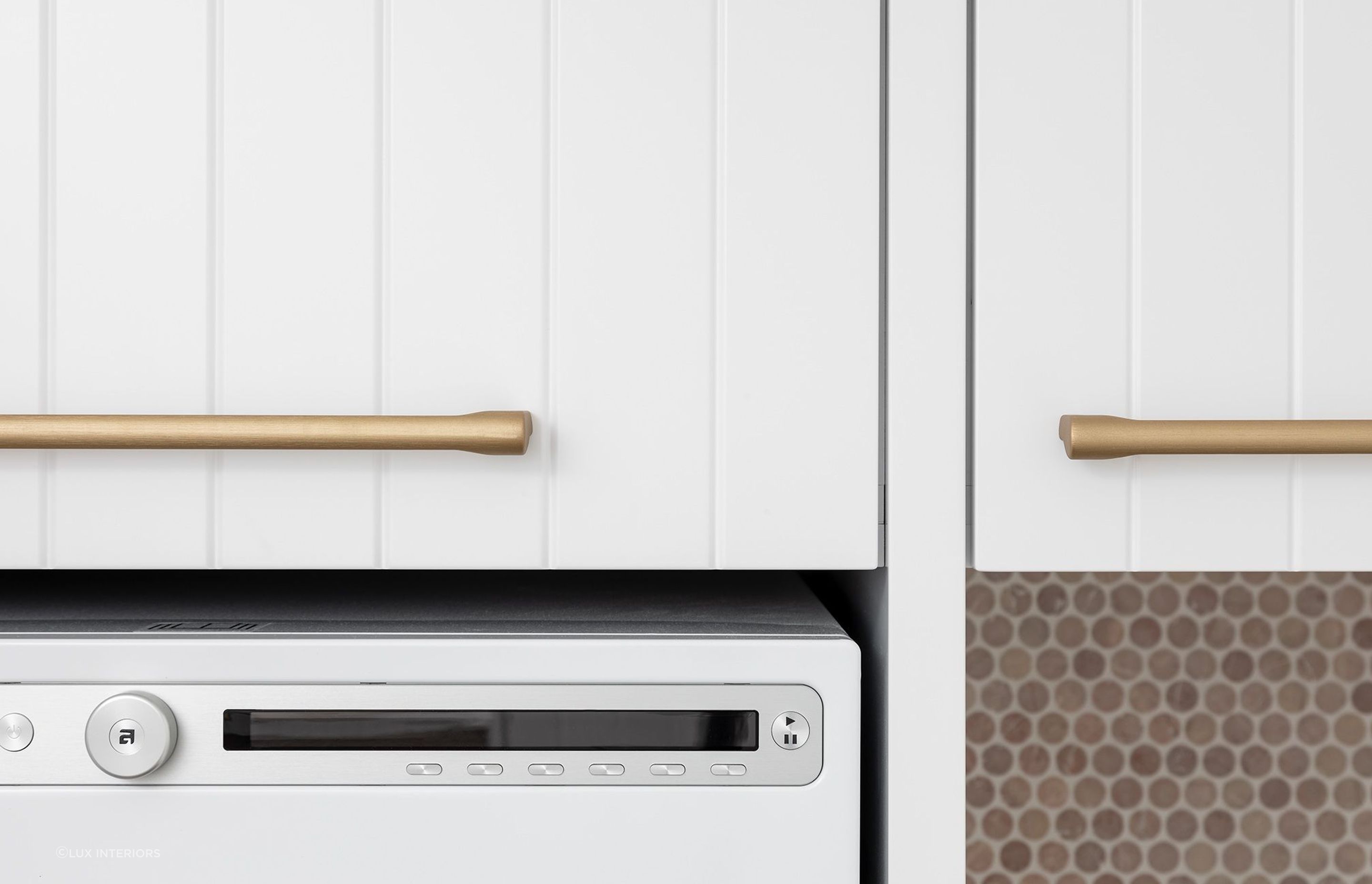 Most modern washing machines have advanced but intuitive controls for ease of use, seen here in the Sholl Project by Lux Interiors.