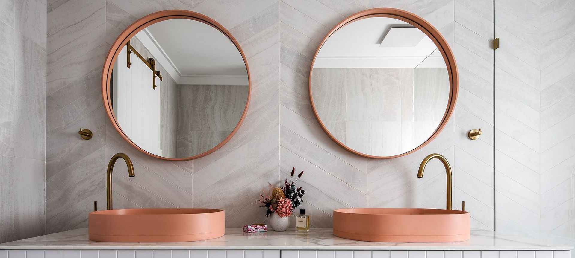 Ensuite by Lux Interiors features a beatiful double bowl vanity