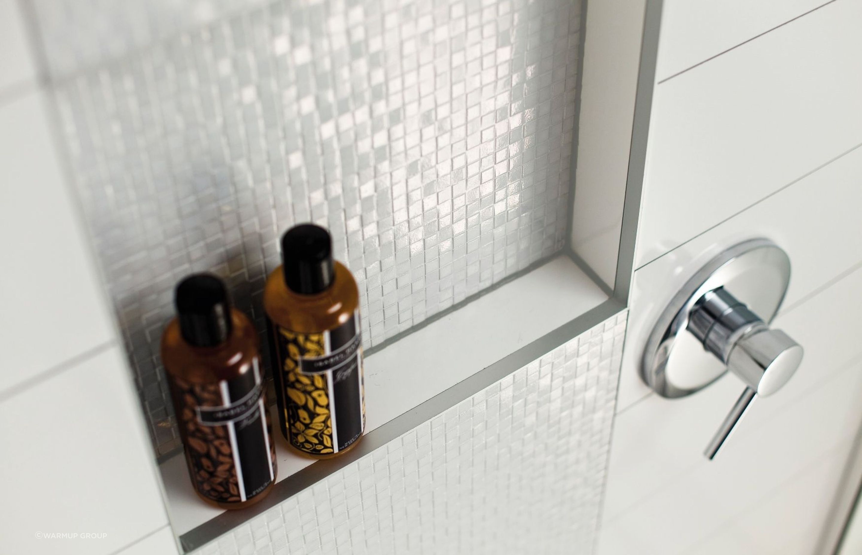 A shower niche like this from Marmox, provides an efficient and tidy way to store your bathroom essentials.