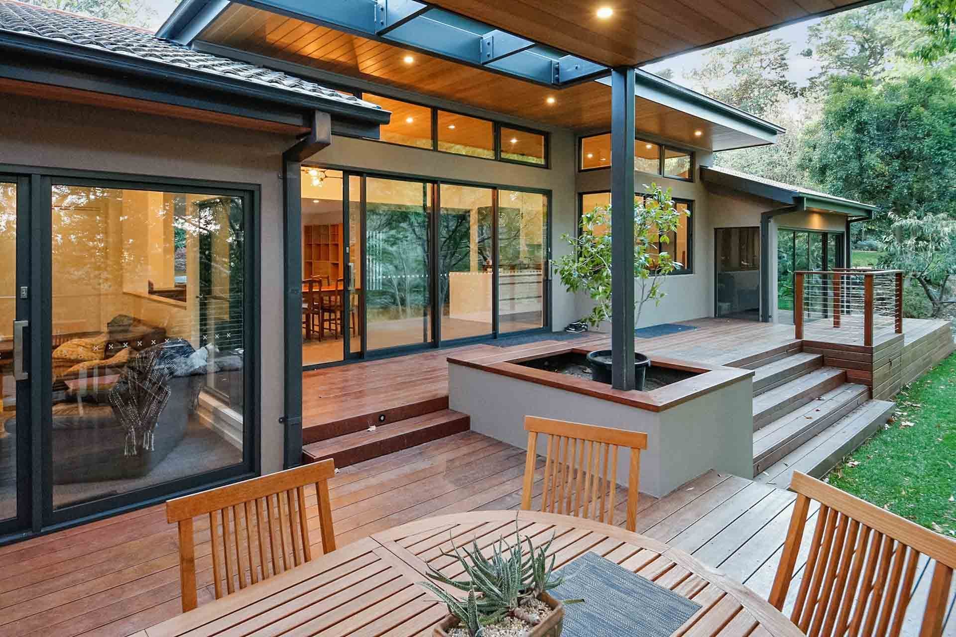 An inviting outdoor deck where the Merbau stands with its rich colour.