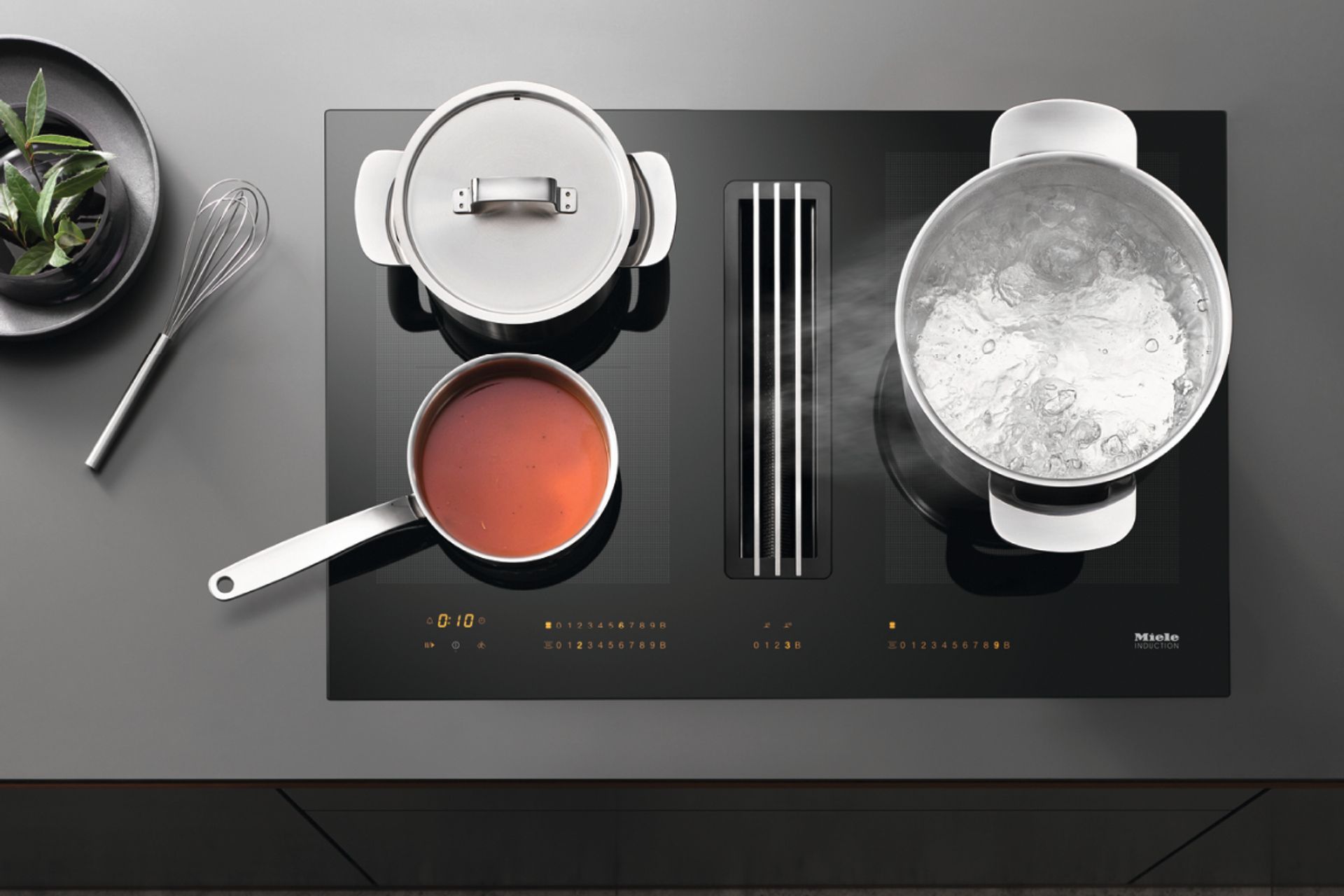 Options like the Miele Induction Cooktop with Integrated Extractor are sleek and full of advanced features.