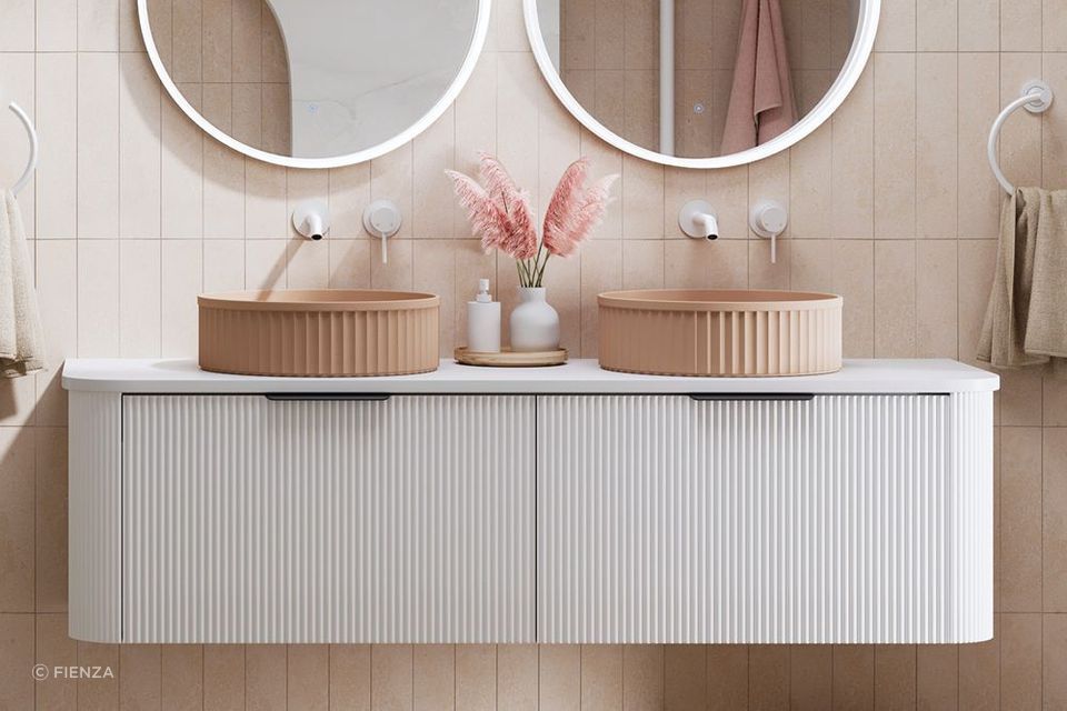 The Minka Curved Wall Hung Vanities save invaluable floor space in the bathroom.