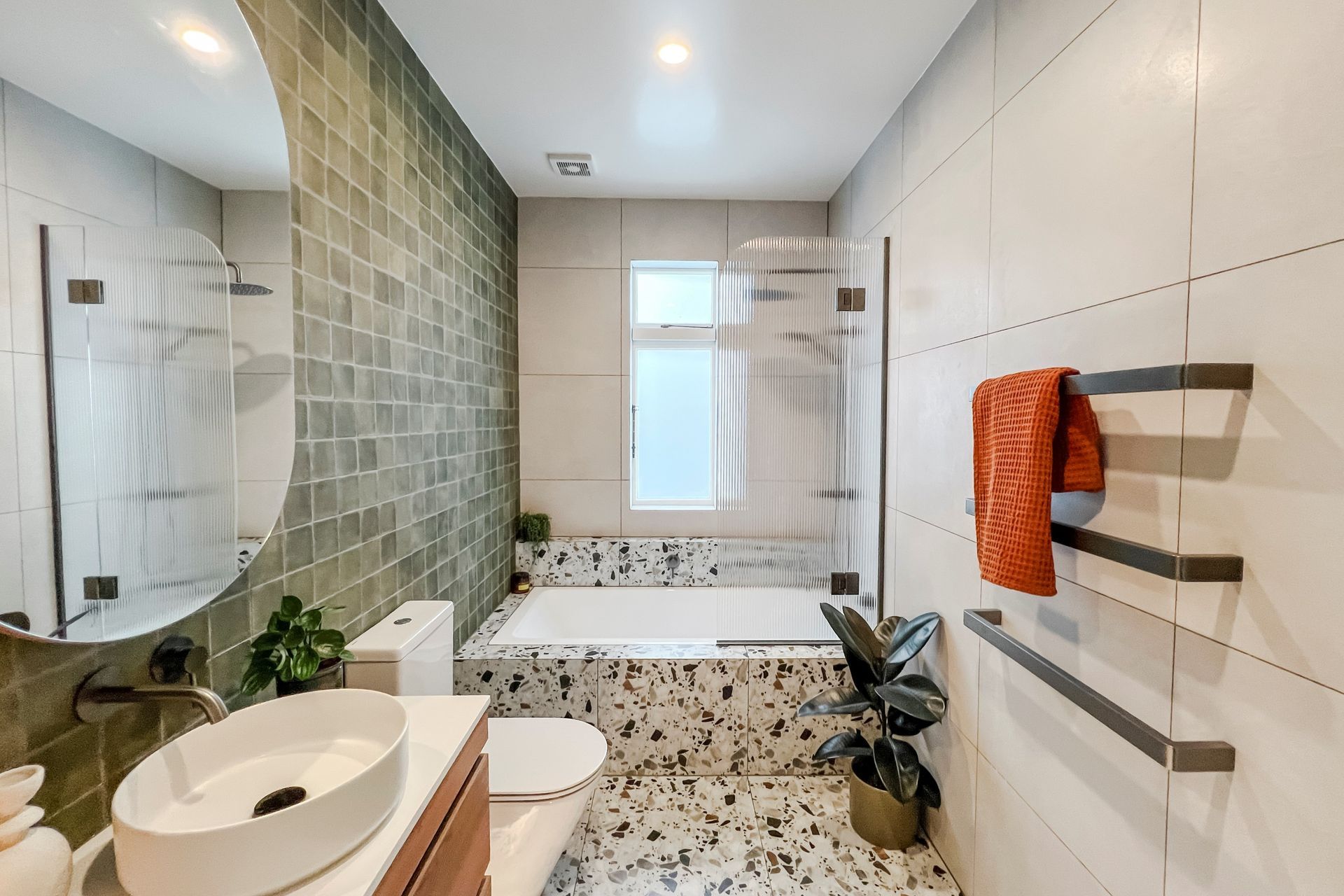 An eye-catching use of texture and tile in this bathroom renovation in Mount Eden by Colab Industry. | Photographer: Lydia Arnold