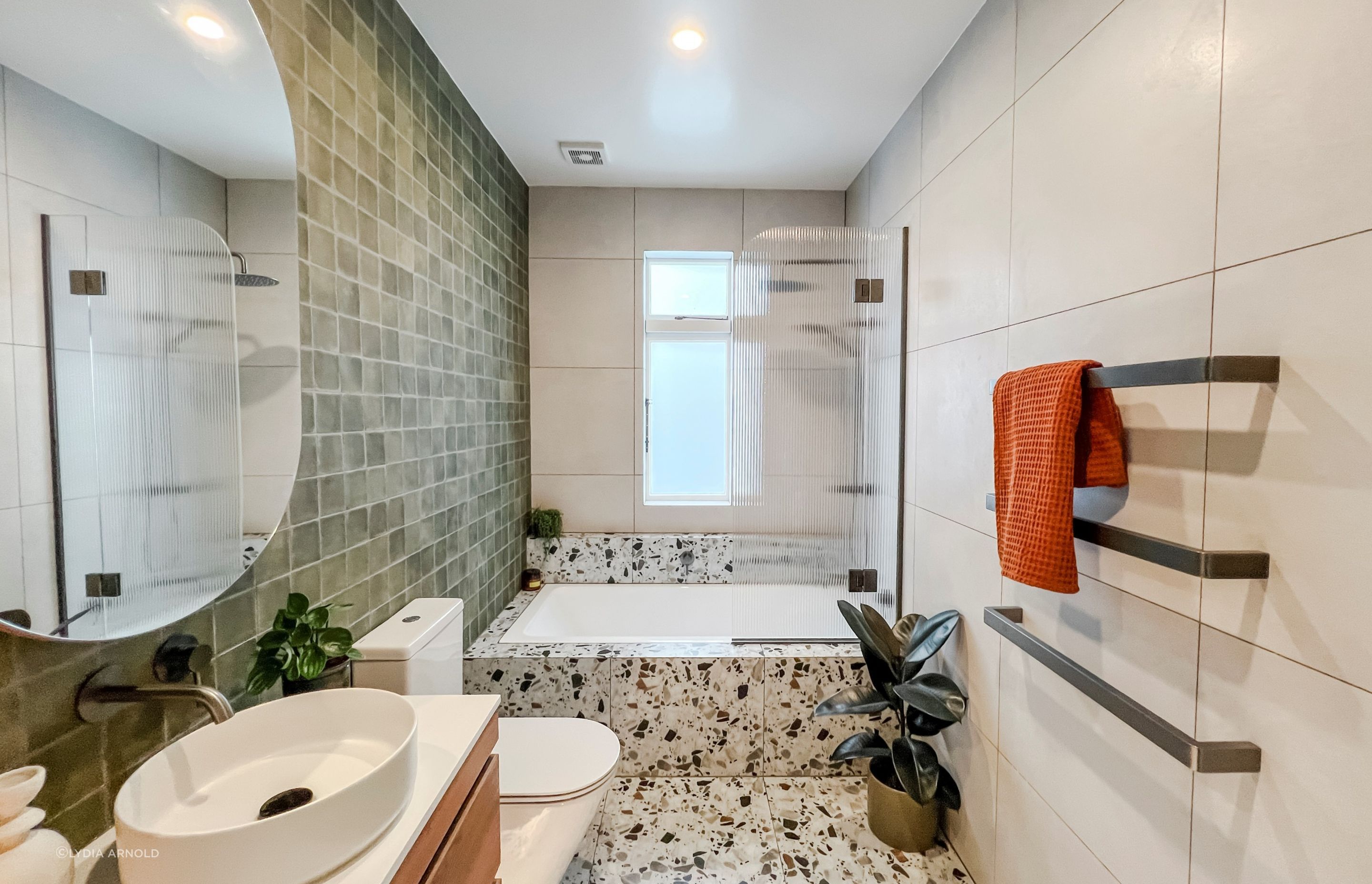An eye-catching use of texture and tile in this bathroom renovation in Mount Eden by Colab Industry. | Photographer: Lydia Arnold