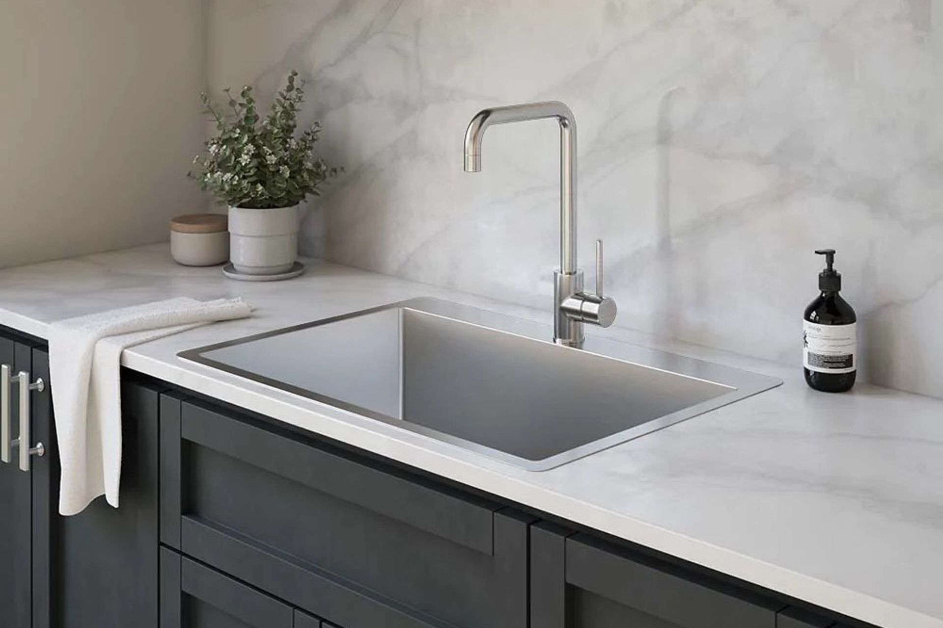 The Noah Large Single Bowl Tap Landing Sink with top mount installation from Buildmat.