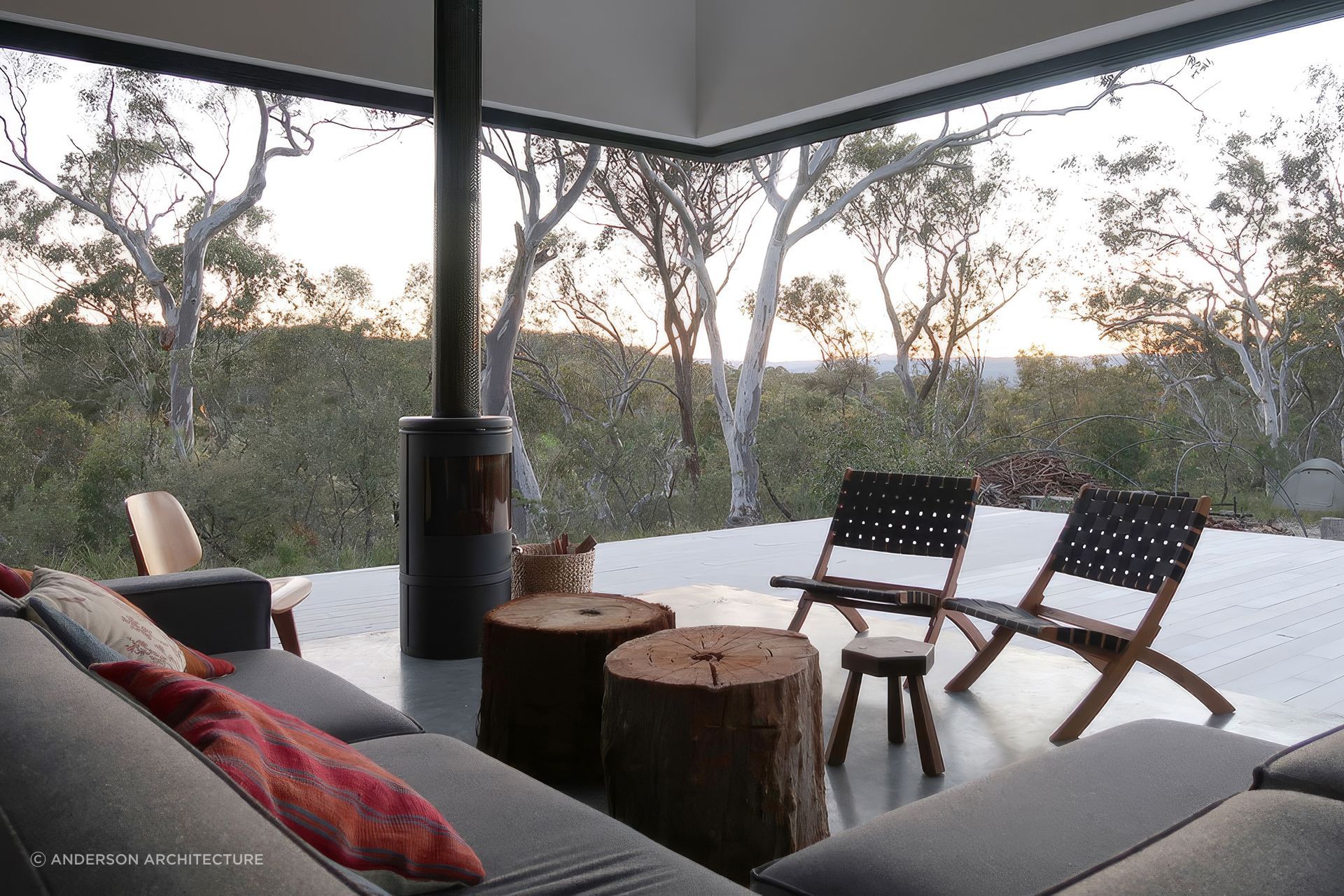 Simon's own off-grid family home in the Blue Mountains was oriented for solar gain and views of the bush.