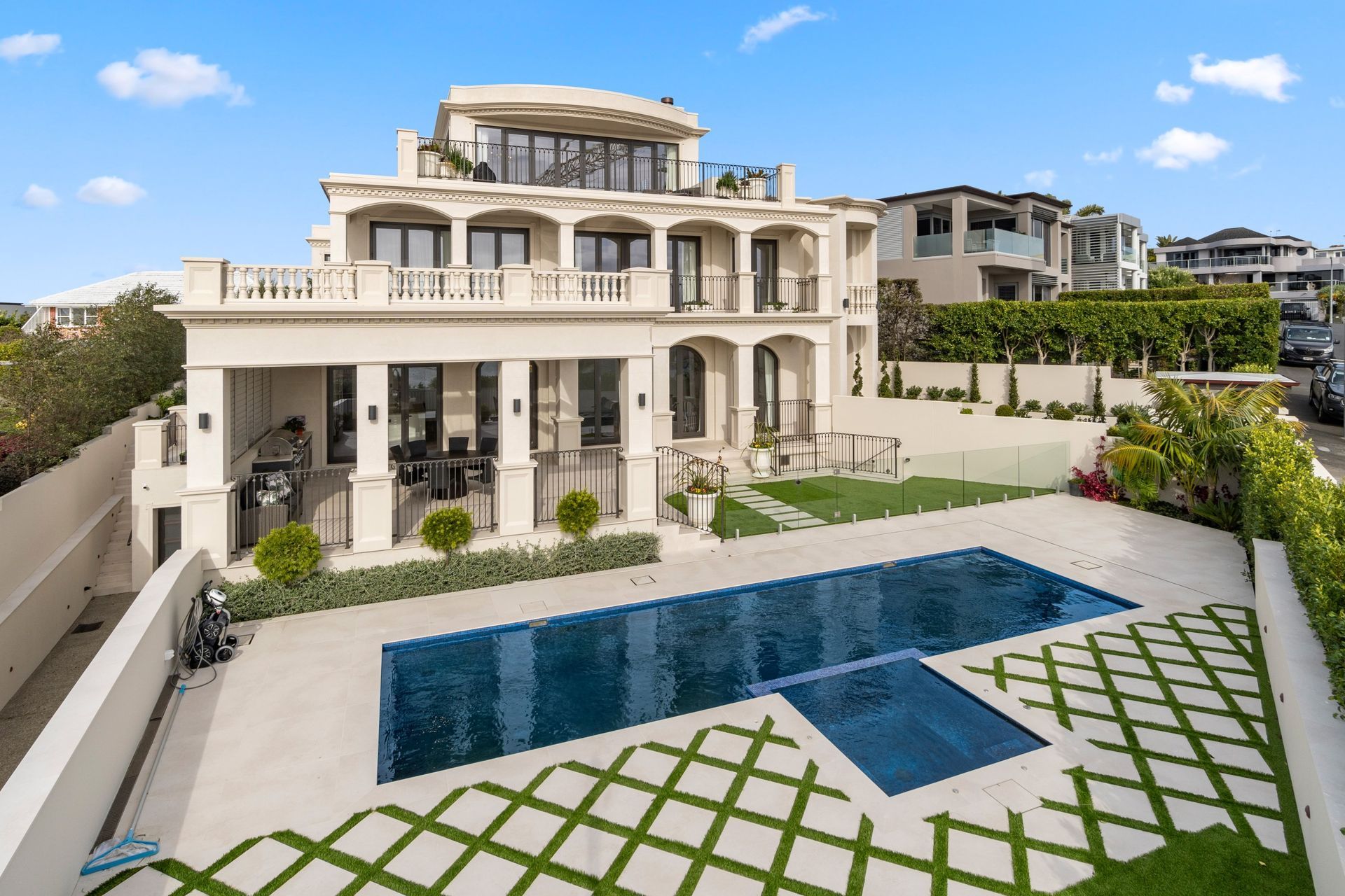 The impact of concrete balustrades is telling, especially in a home like the luxury build in Orakei. | Photography: Grant Drummond, Joel Staveley, BizVideo