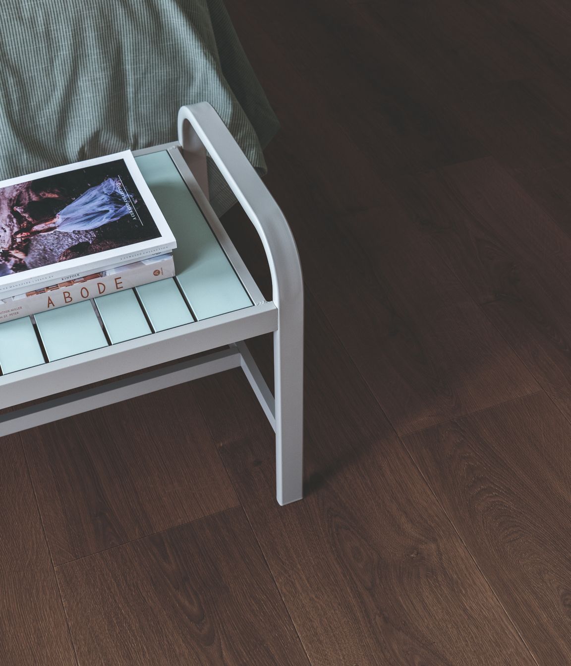 Dark timber tones create a sense of warmth and quiet luxury.