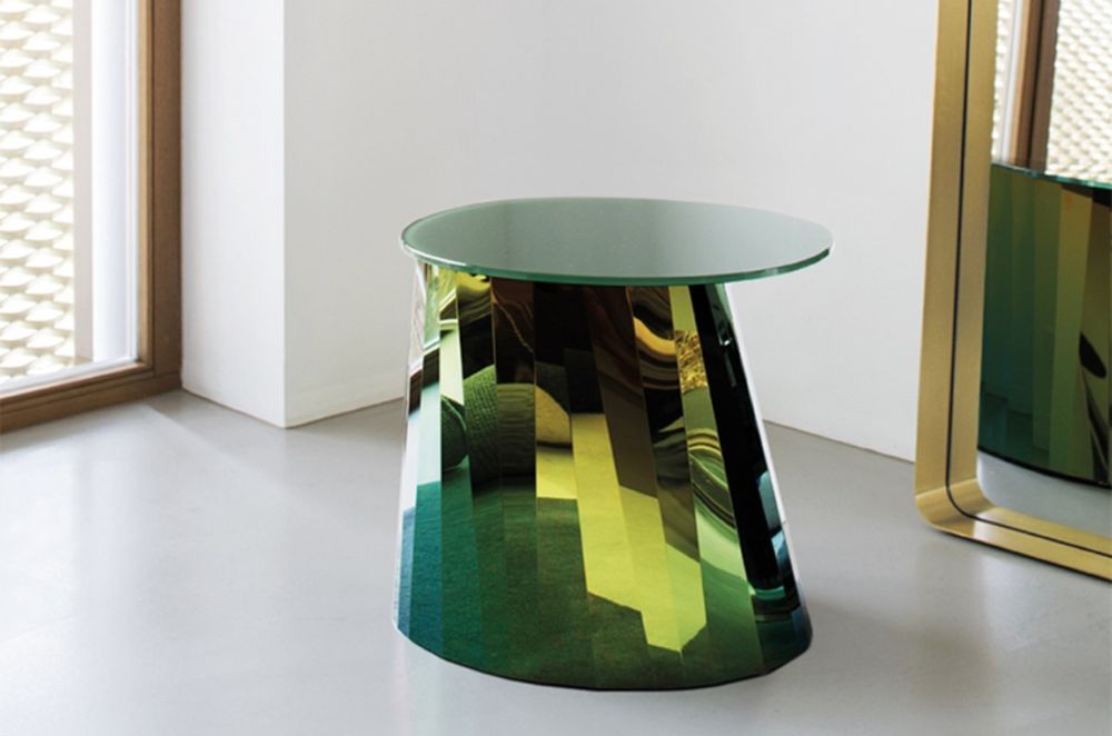They don't get more glamourous and glossy than the Pli Side Table by Classicon