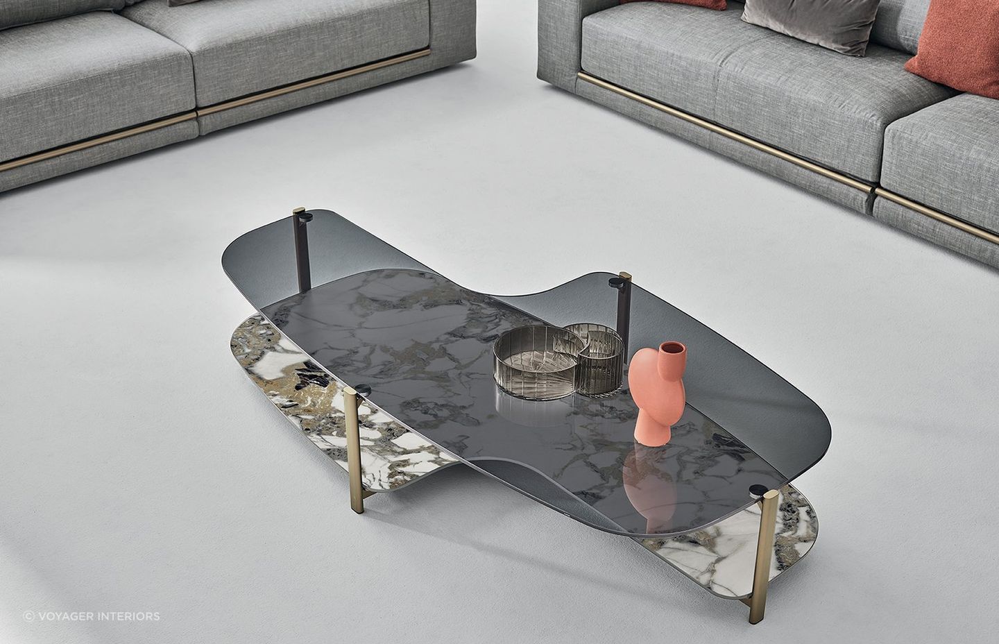 This double-layered coffee table provides extra space while showcasing a glass tabletop and a marble surface.