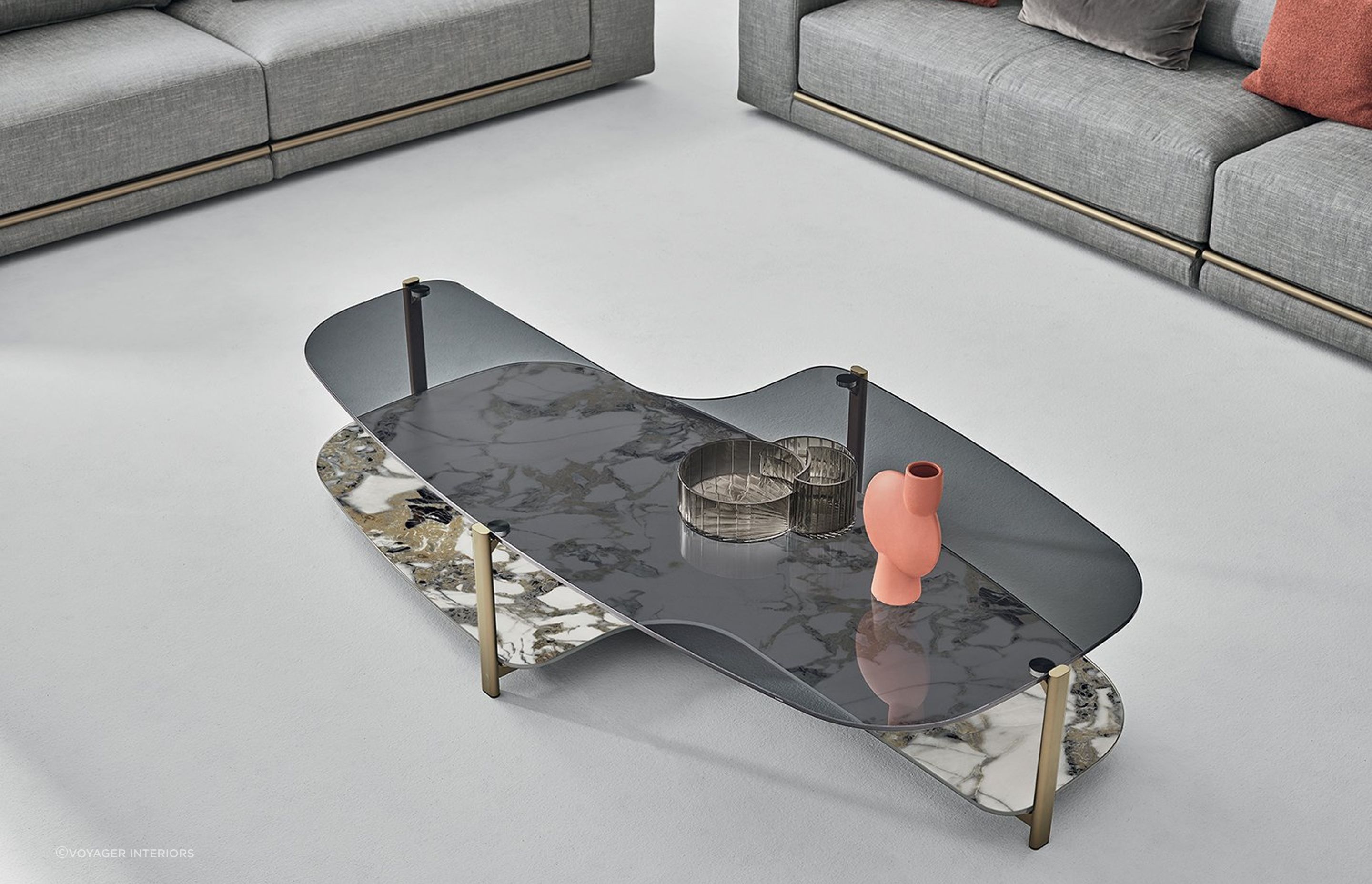 This double-layered coffee table provides extra space while showcasing a glass tabletop and a marble surface.
