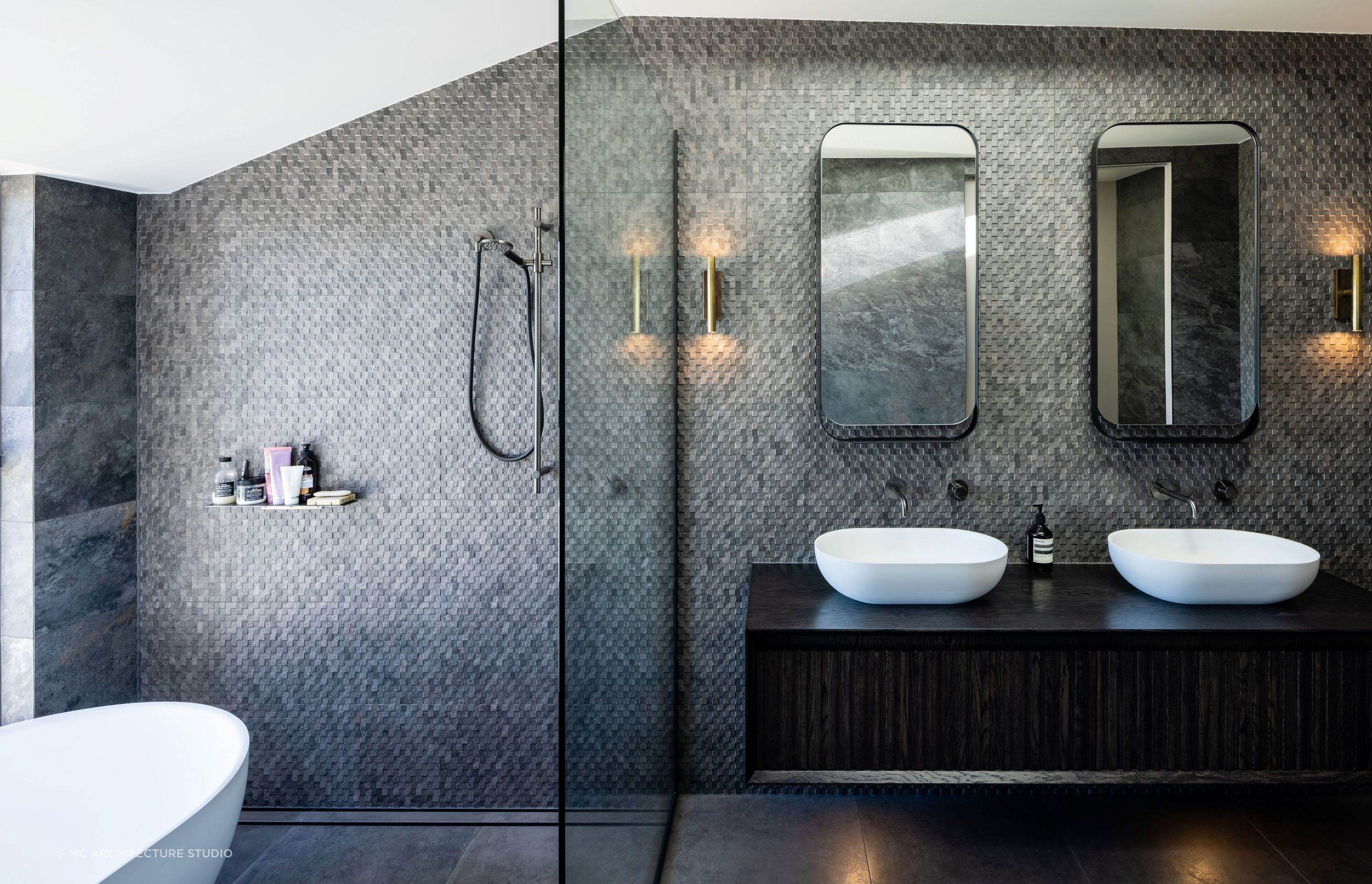 A mesmerising wall of mosaic tiles in the stunning master en suite at Parsons House in Christchurch — Photography: Clinton Lloyd