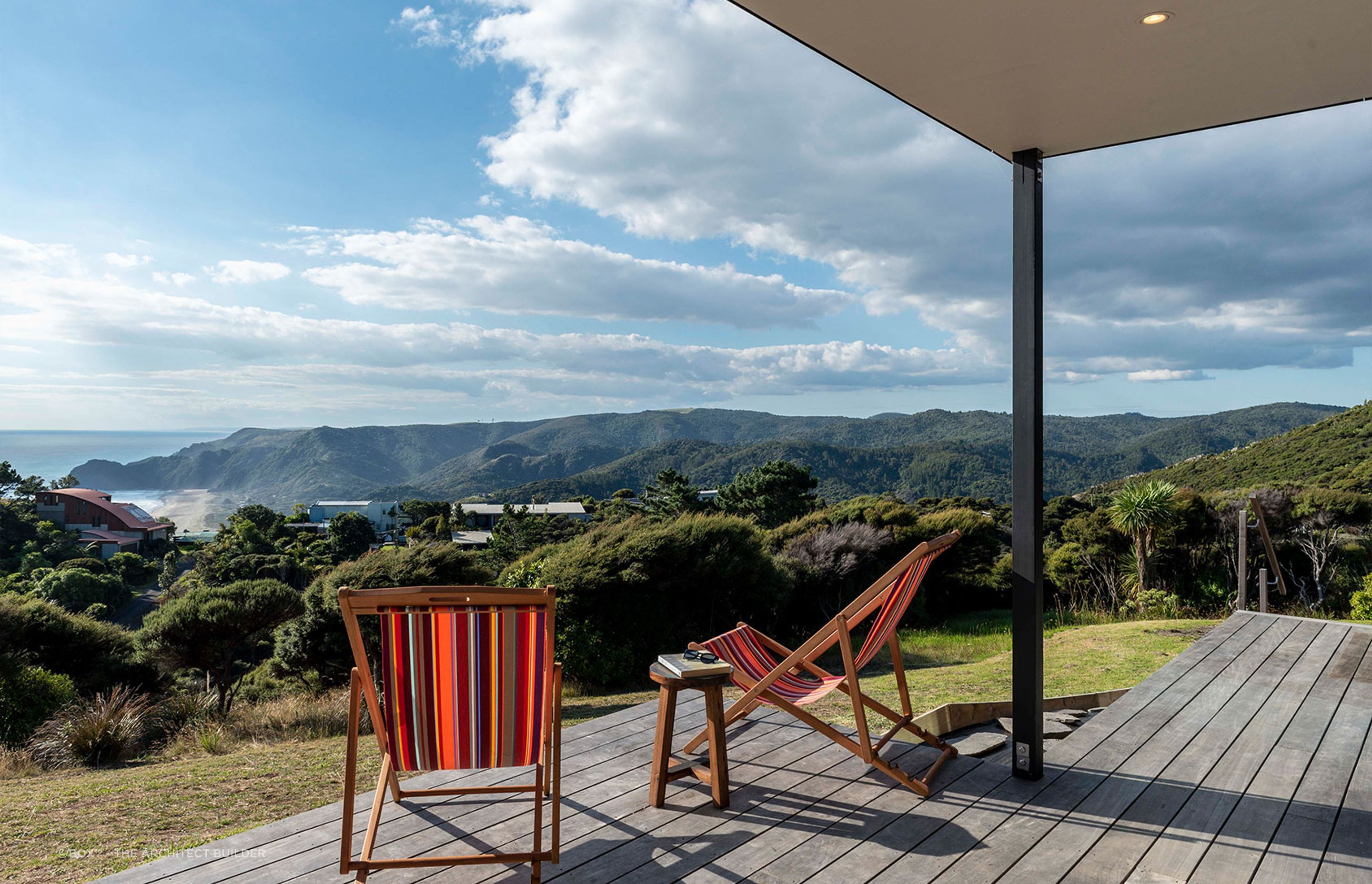 Matching deck chairs are the perfect choice, especially when there's a view like this to enjoy. | Photography: Sophie Heyworth