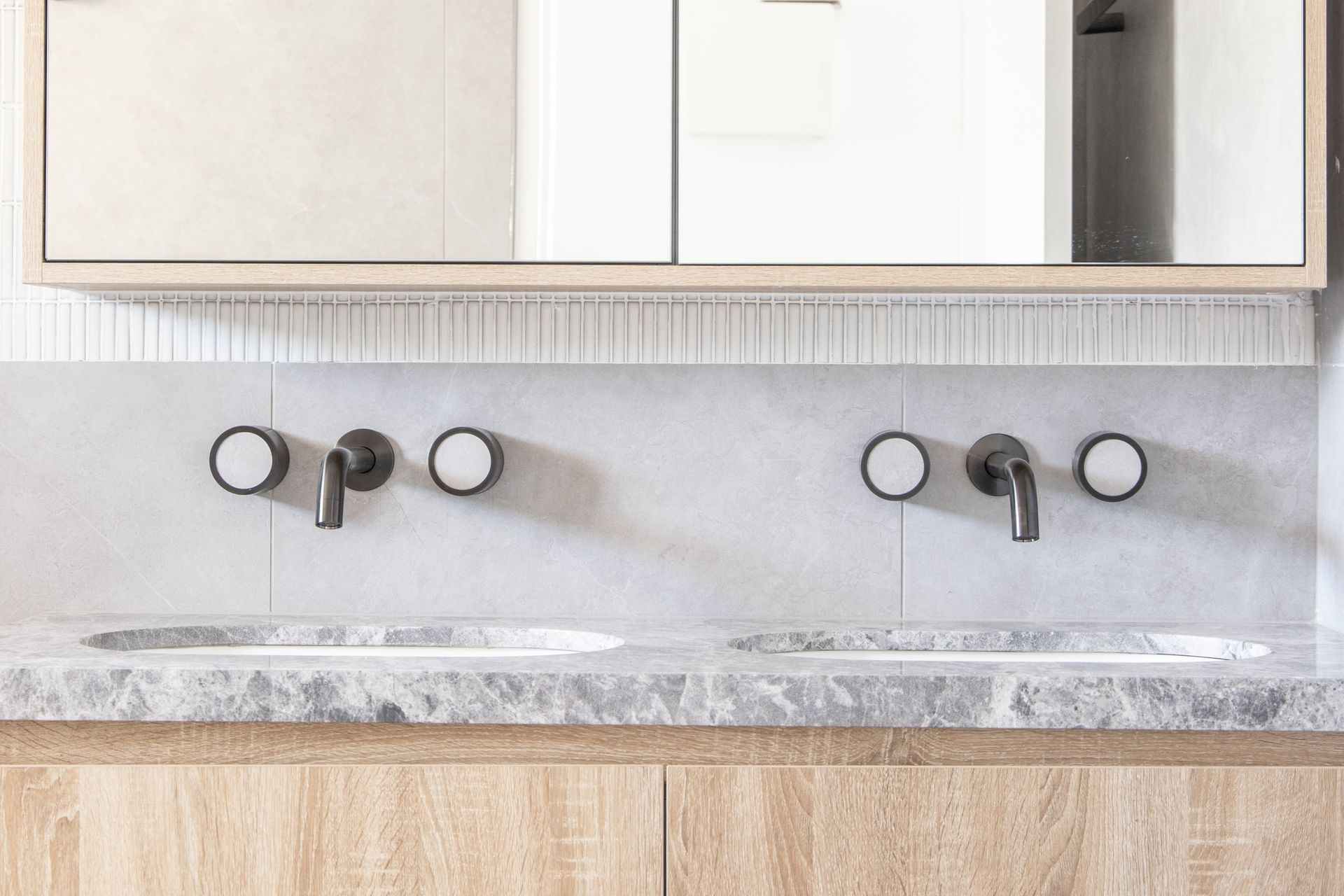 Matching Pixi Tile Insert Assembly Taps from ABI Interiors give contemporary vibes.