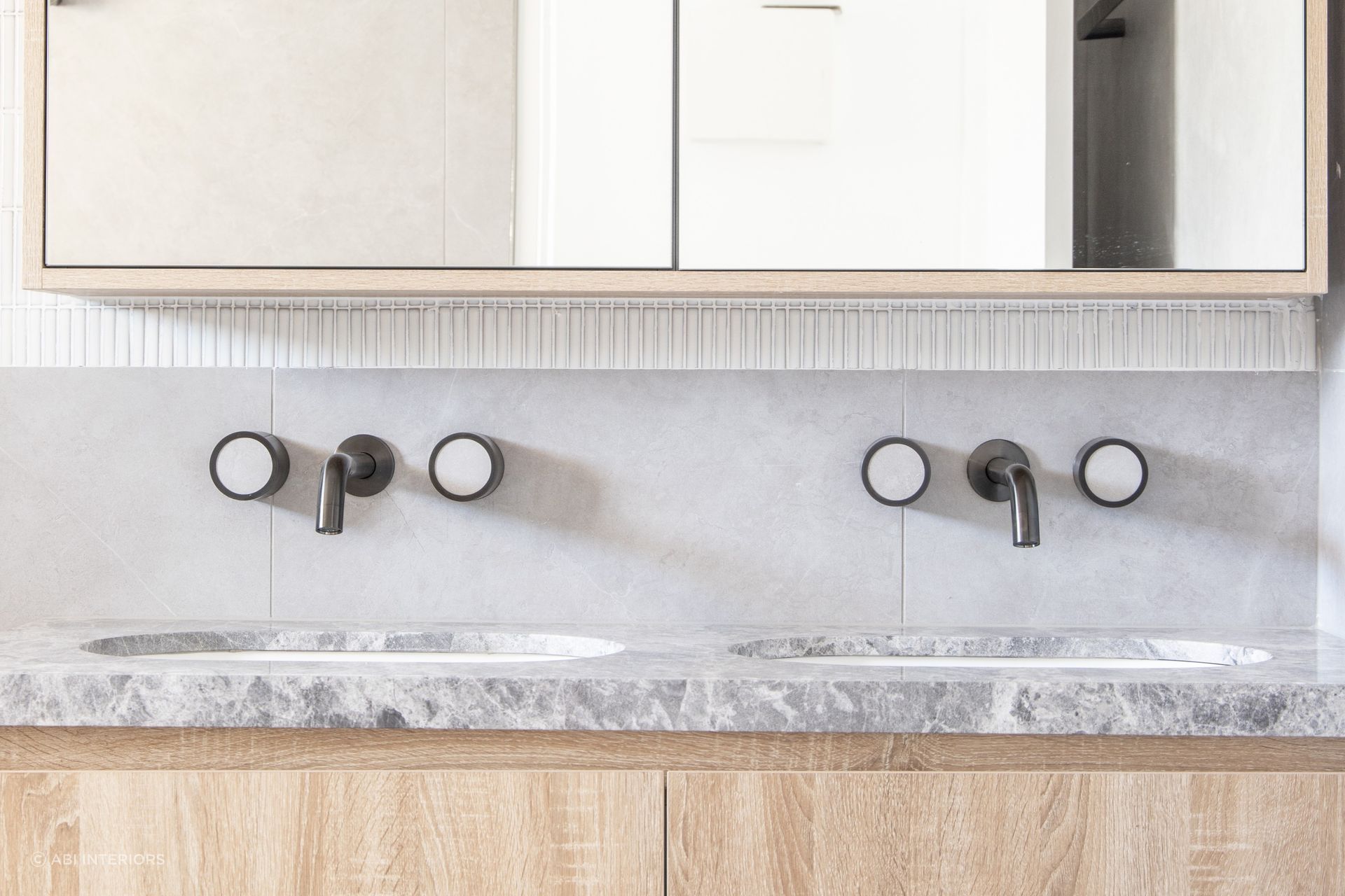 Matching Pixi Tile Insert Assembly Taps from ABI Interiors give contemporary vibes.