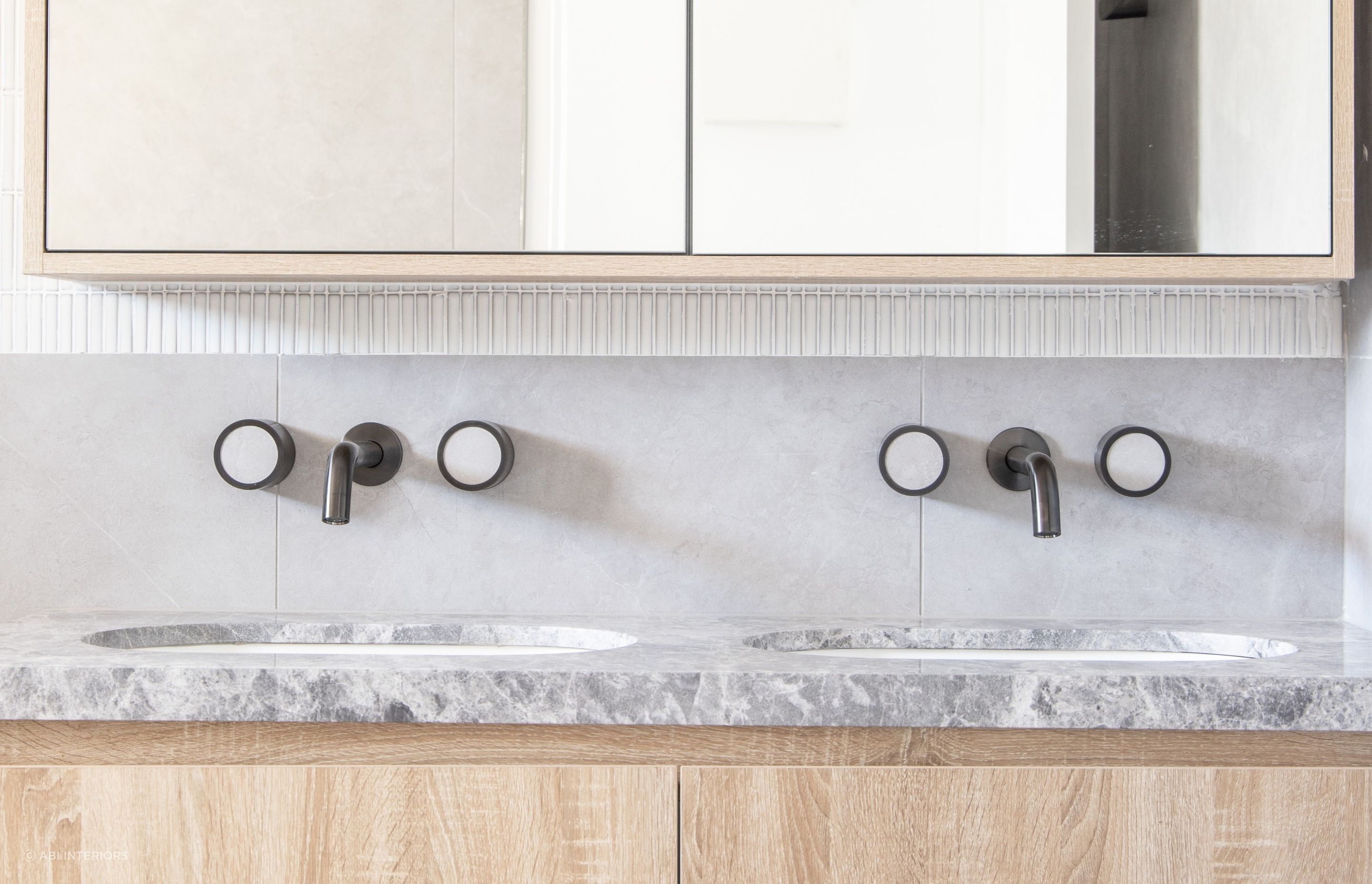 Matching Pixi Tile Insert Assembly Taps from ABI Interiors give contemporary vibes.