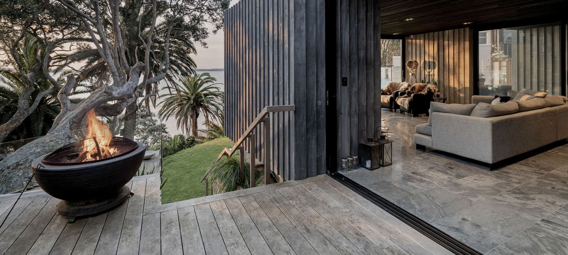 Superb indoor-outdoor flow with this stunning home in Pt Chevalier by Ponting Fitzgerald Architects.