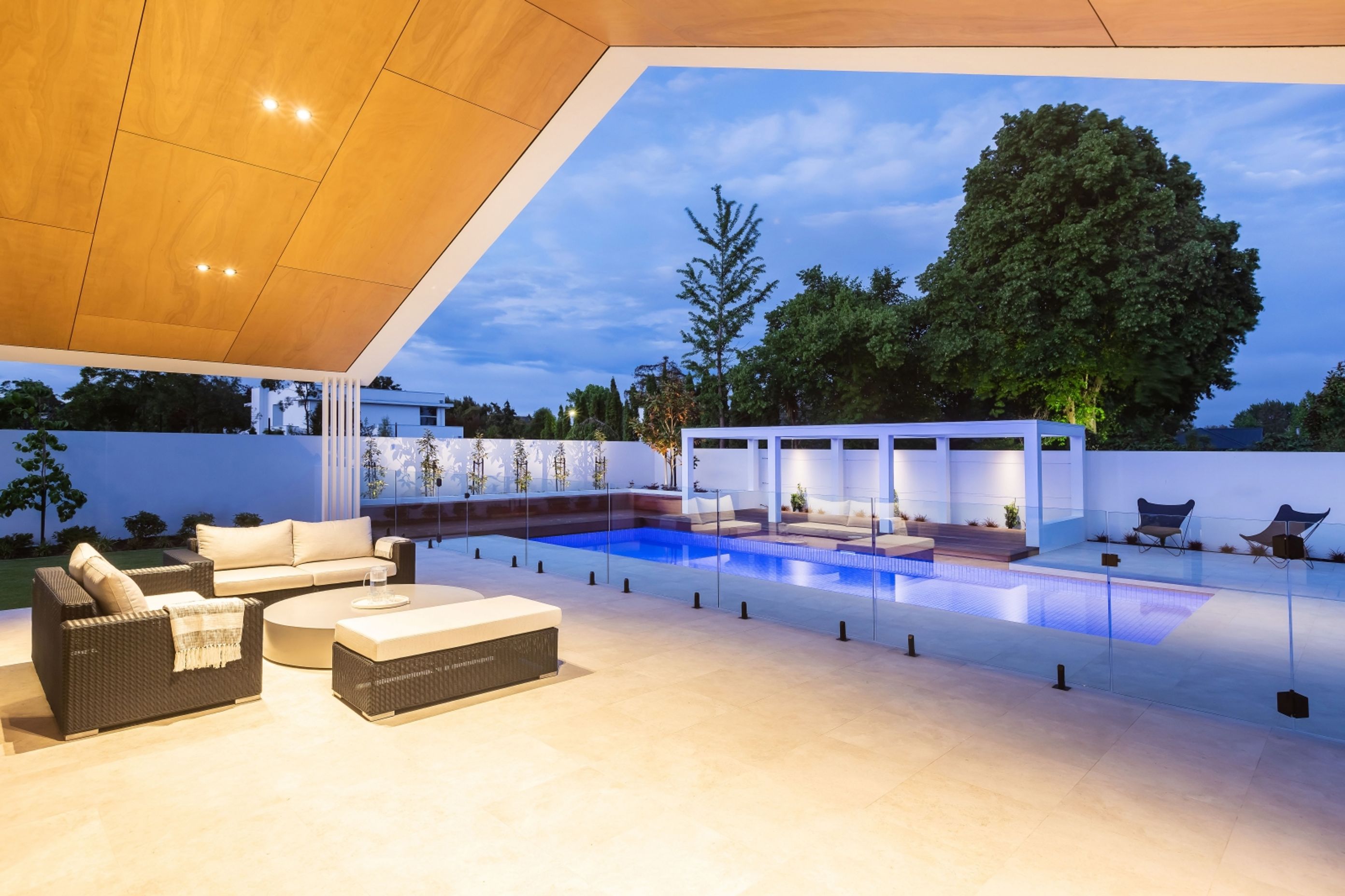 A Glass Pool Fence by NZ Frameless Glass shows just how sleek these solutions can be.