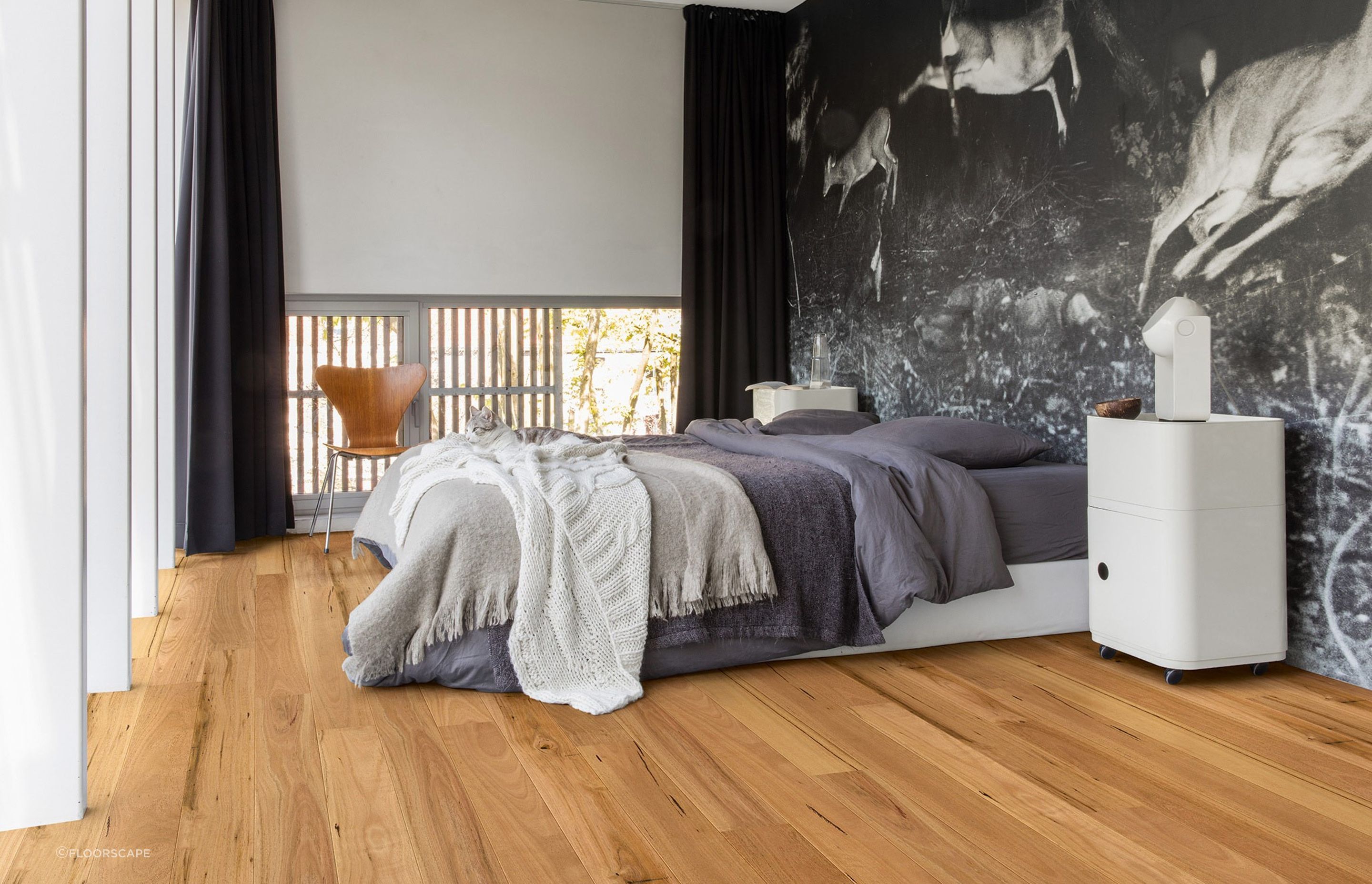 Wooden flooring with natural lightness, like this Quick-step Amato Blackbutt Flooring, will brighten a space effortlessly.