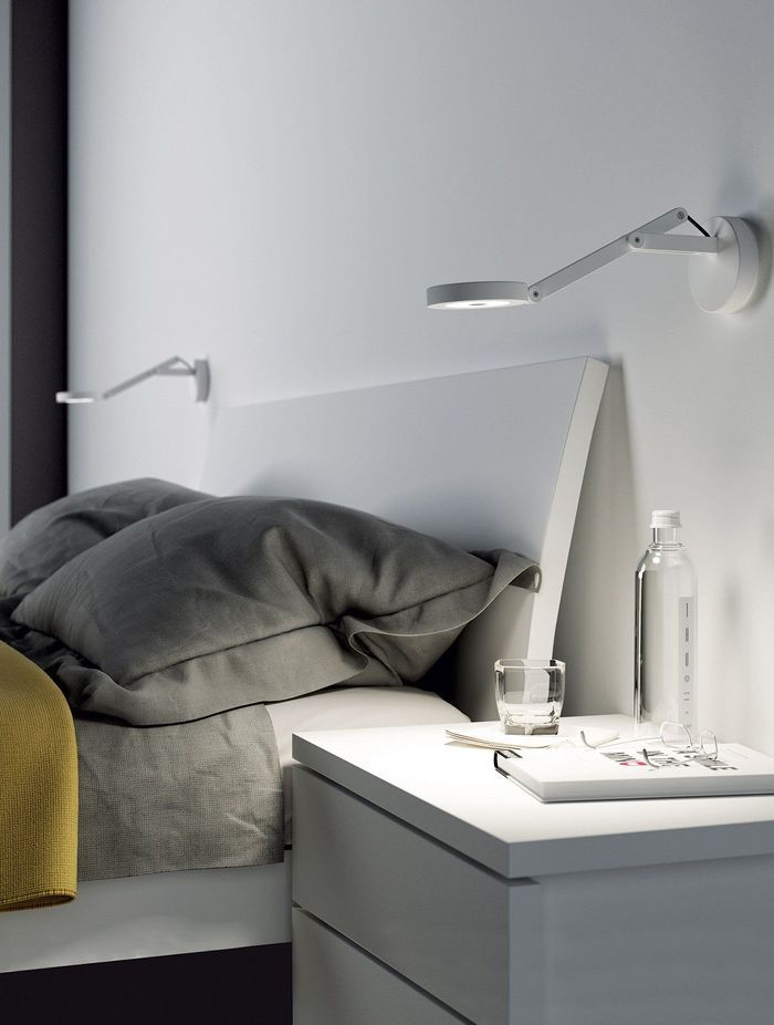 Bedside wall lights, like these String W0 Wall Lamp
By Mondoluce, are a great choice for those who enjoy an evening read.