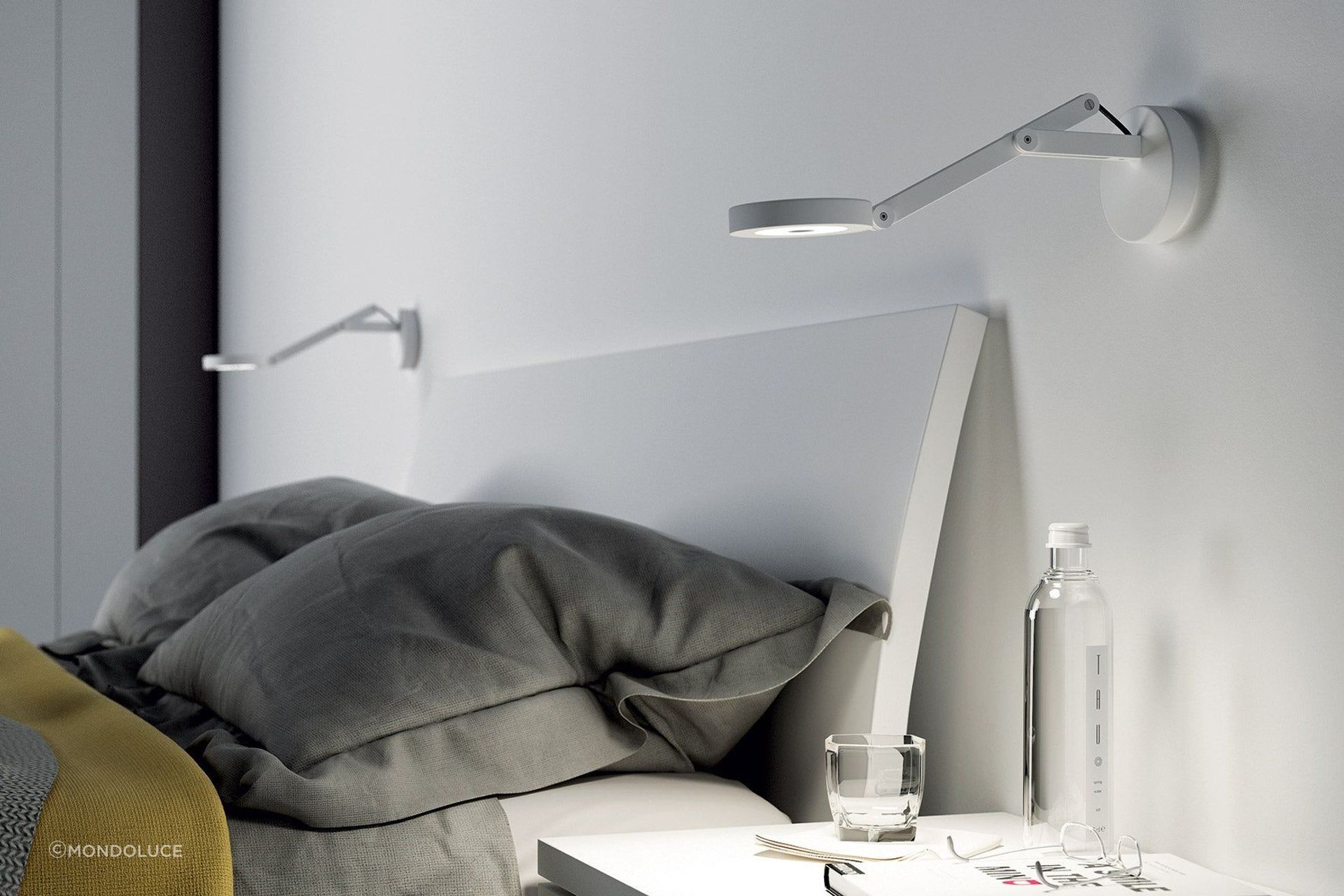 Bedside wall lights, like these String W0 Wall Lamp
By Mondoluce, are a great choice for those who enjoy an evening read.