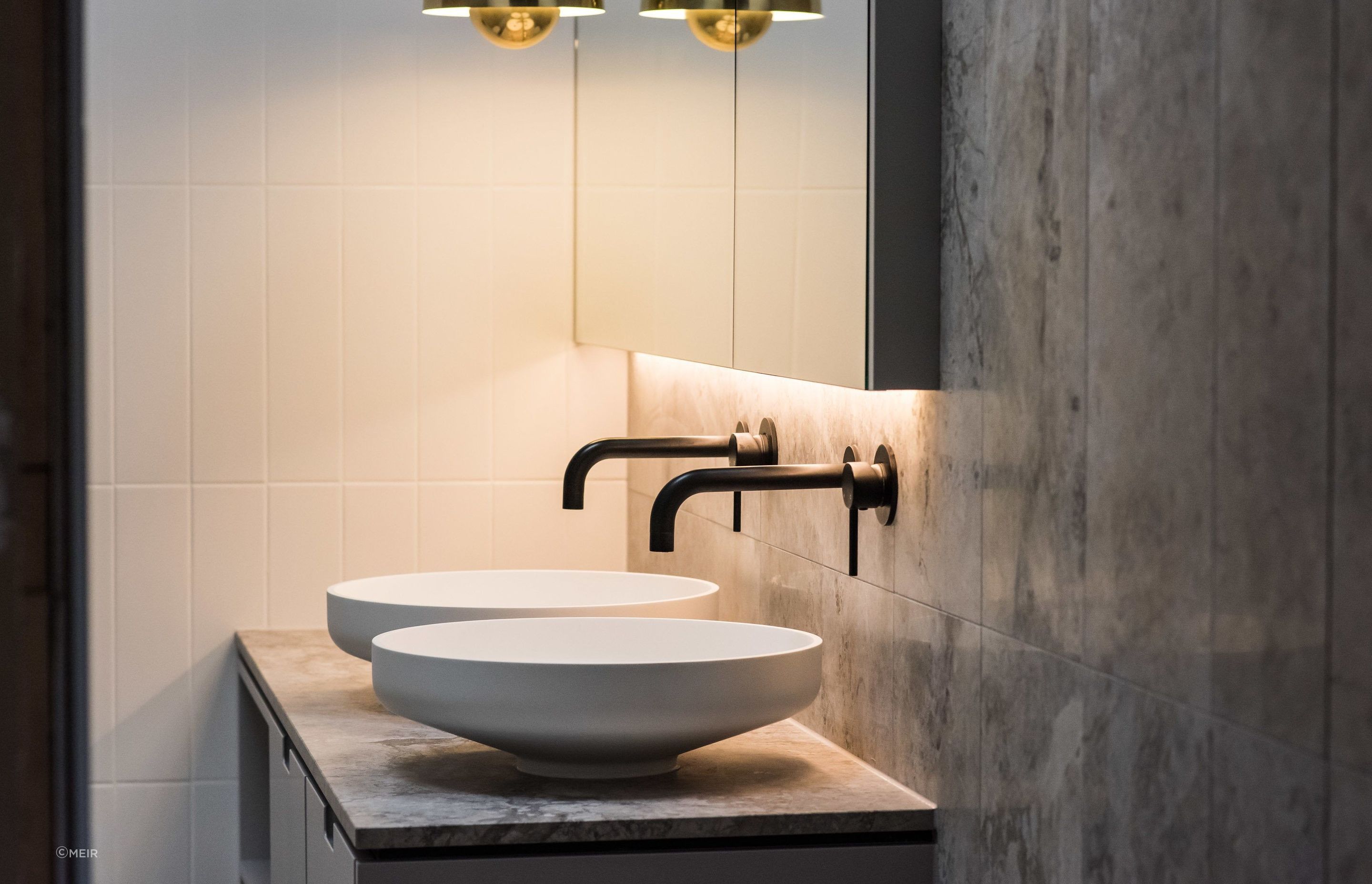 Distinctive appeal and less visible water marks — great reasons to go for an option like these Round Wall Mixer Taps in Matte Black.