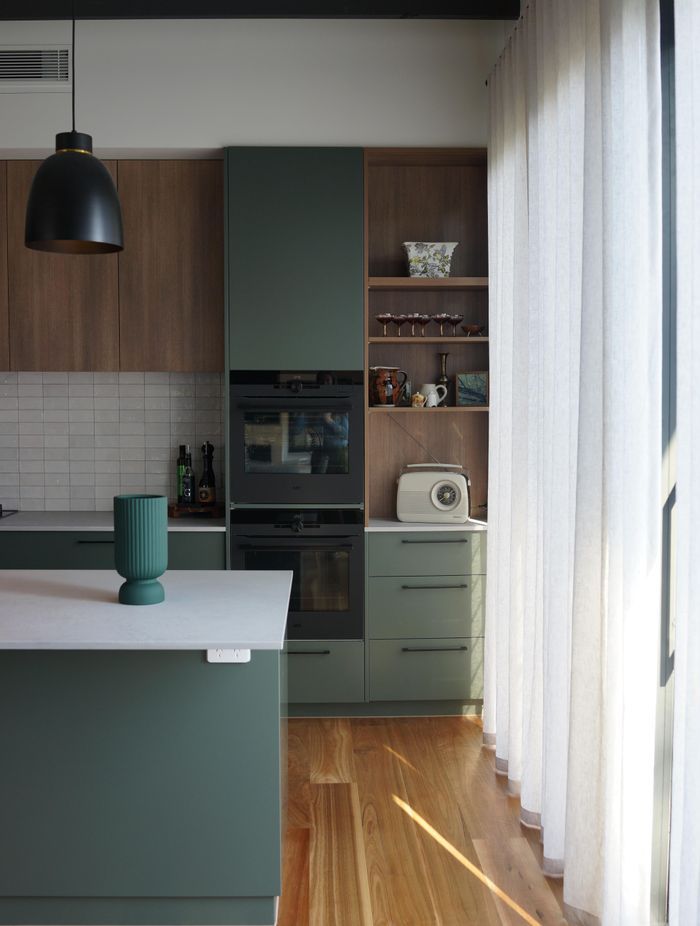 A stunning green-toned kitchen by Ilm Interiors.