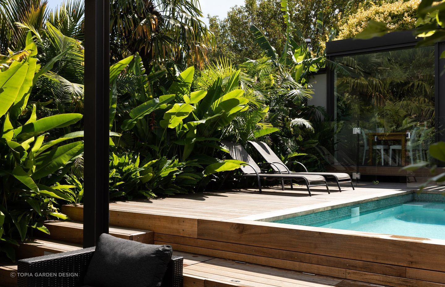 Picking plants that will prosper in your climate is fundamental to success, seen here in this stylish outdoor space in sub-tropical Auckland.