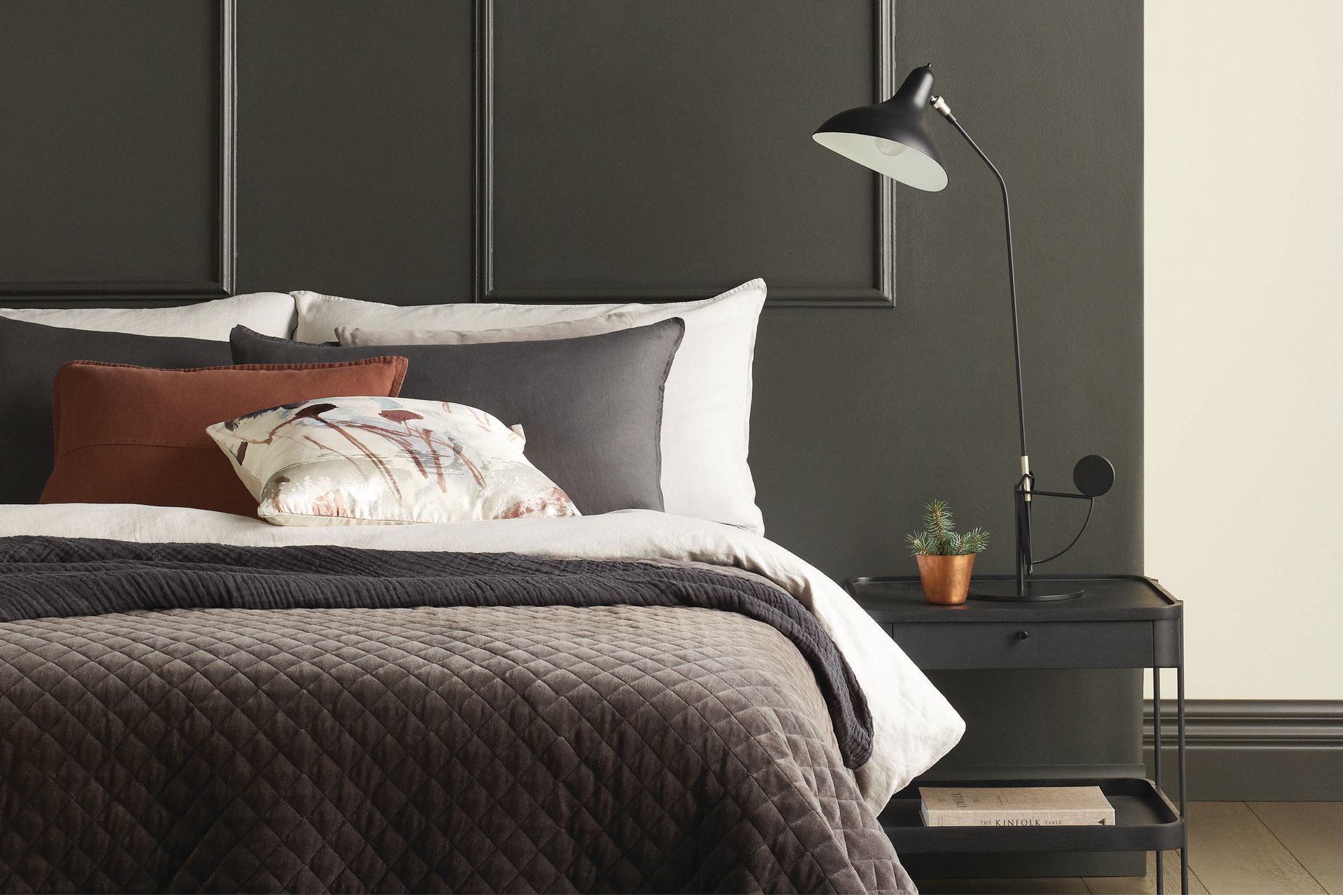 Dark greys, like Porter's Paints River Stone, are increasingly finding a place in the bedroom.