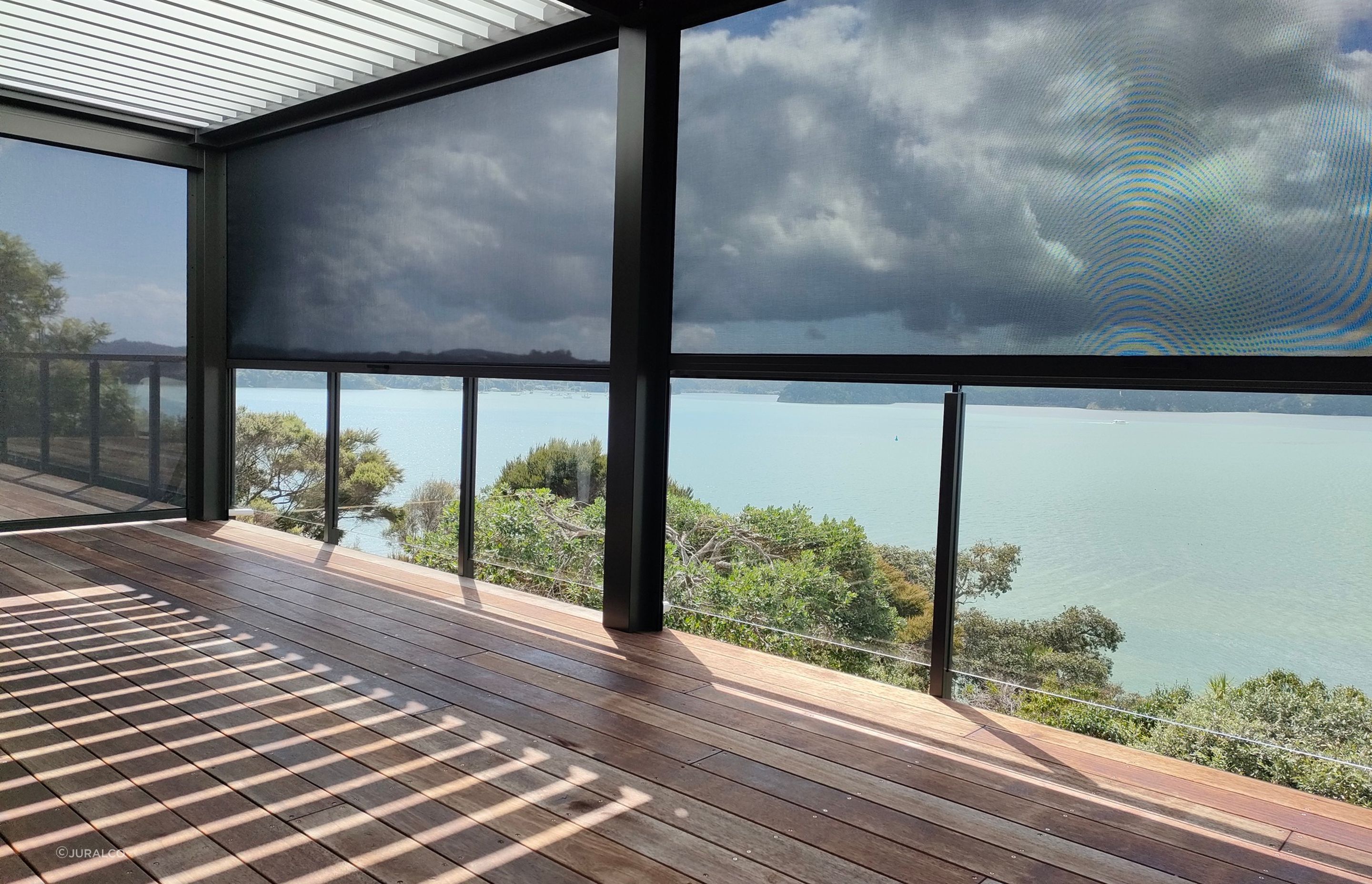 By following a thorough process, you'll ensure you pick the right outdoor blinds for your space, seen here with the Solarzip® Outdoor Blinds
from Juralco.
