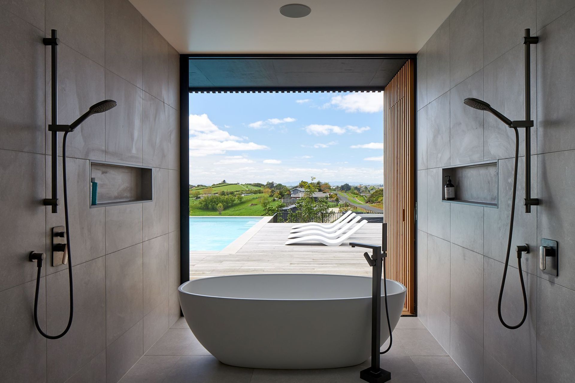 The showers help frame the beautiful view at the S&amp;P House on the outskirts of Hamilton — Photography: Simon Wilson