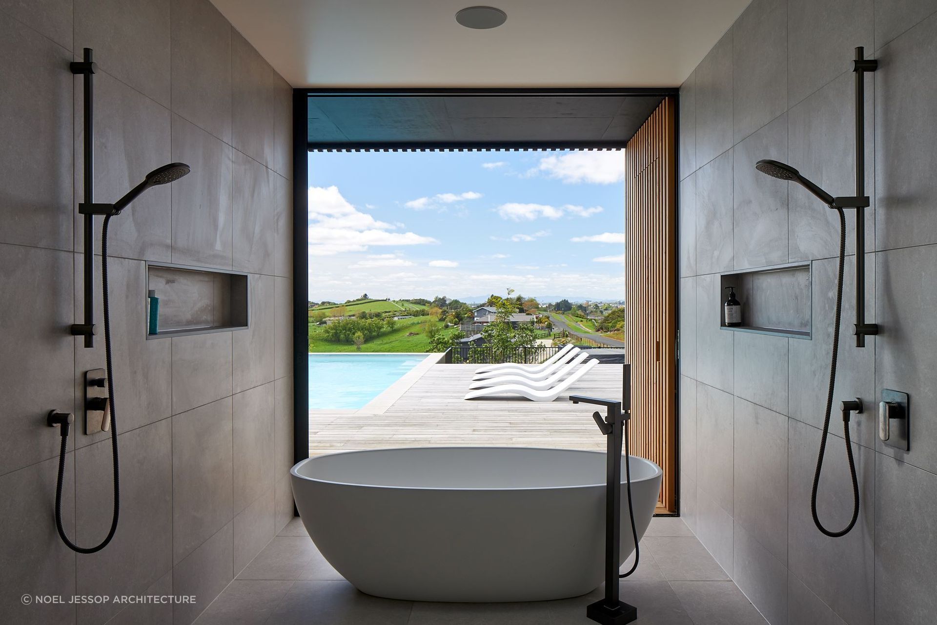 The showers help frame the beautiful view at the S&P House on the outskirts of Hamilton — Photography: Simon Wilson
