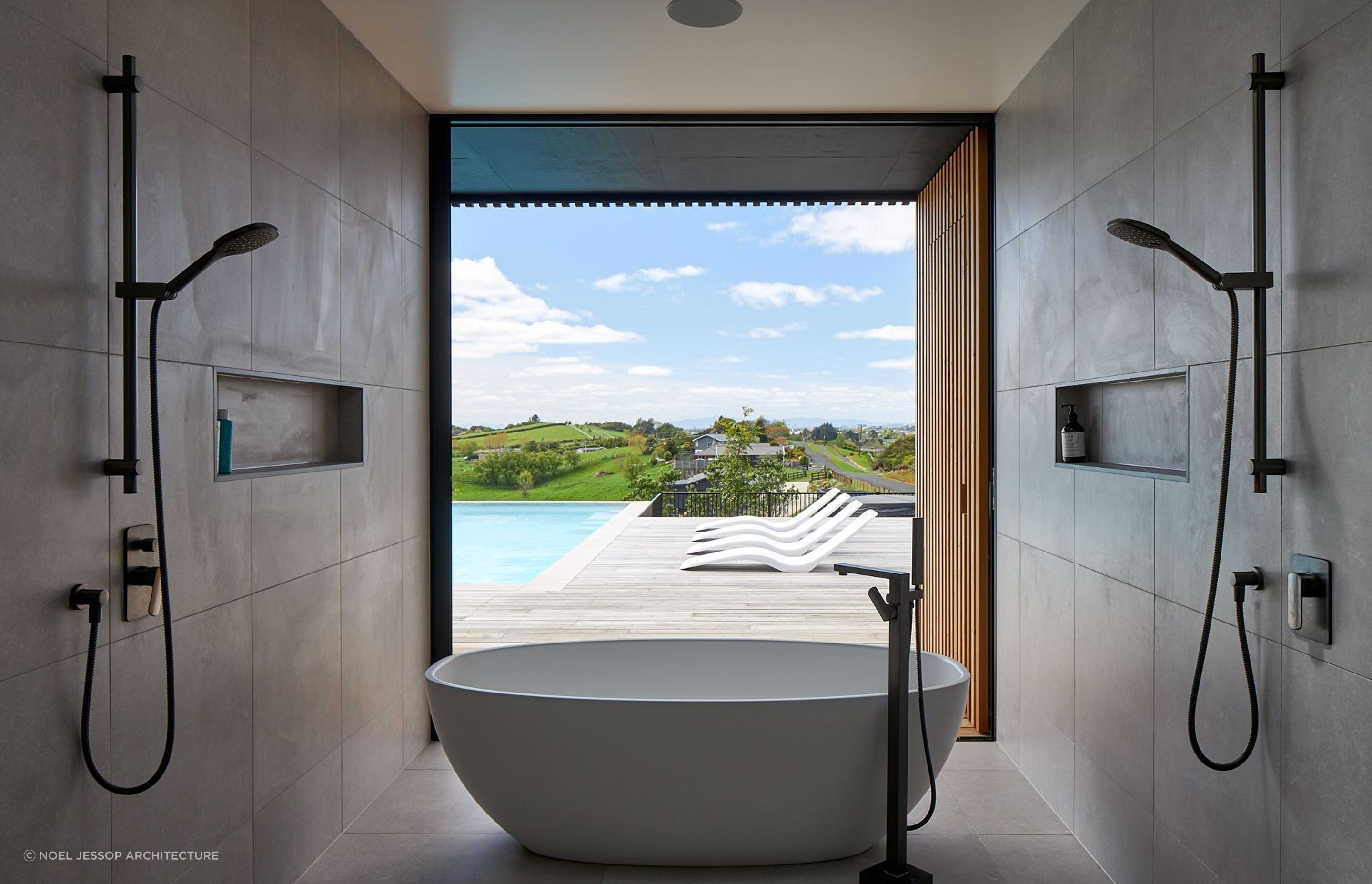 The showers help frame the beautiful view at the S&amp;P House on the outskirts of Hamilton — Photography: Simon Wilson