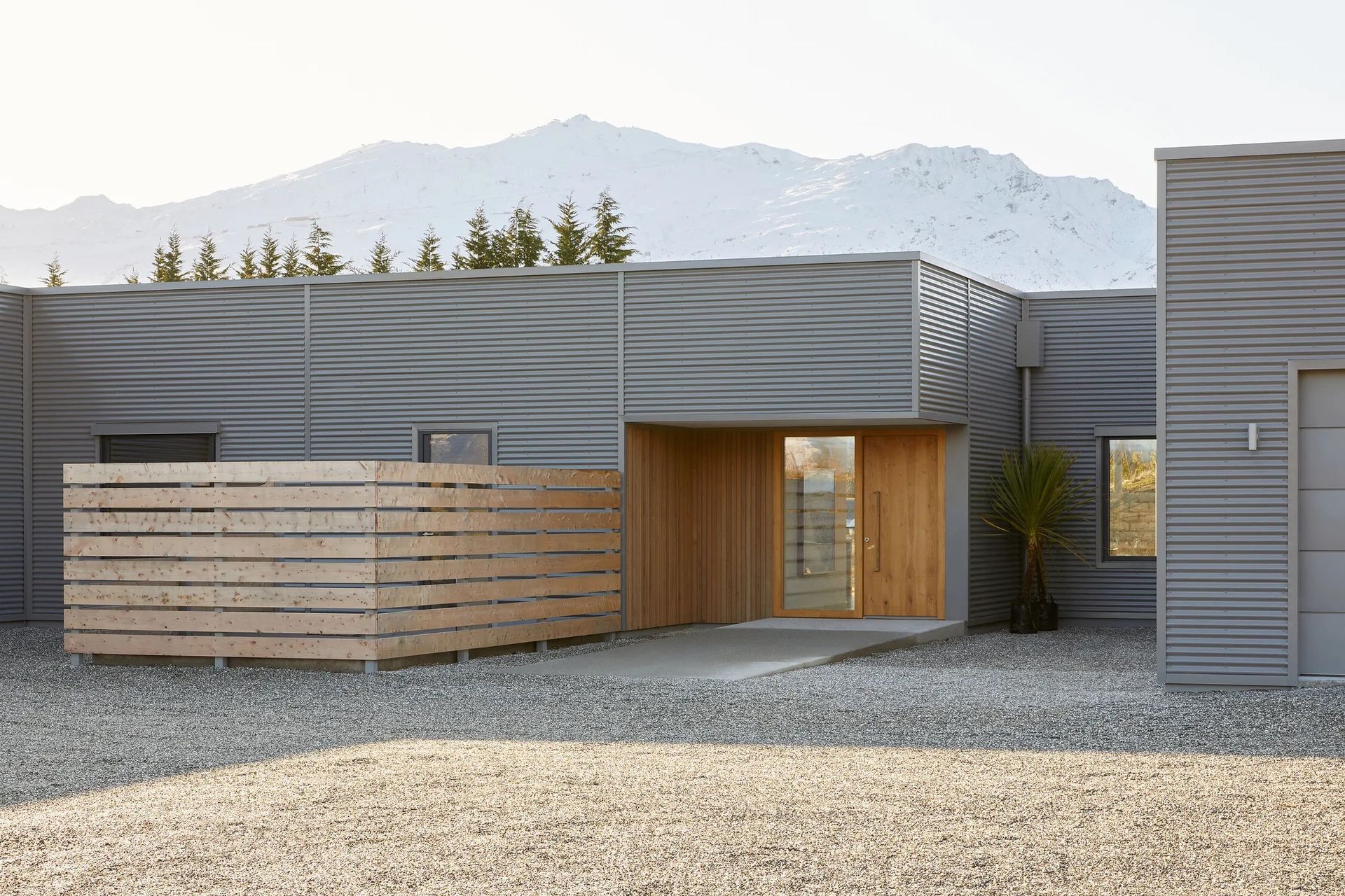 Hardscaping can enhance kerb appeal when done well, demonstrated here with the impressive Passive House in Queenstown.