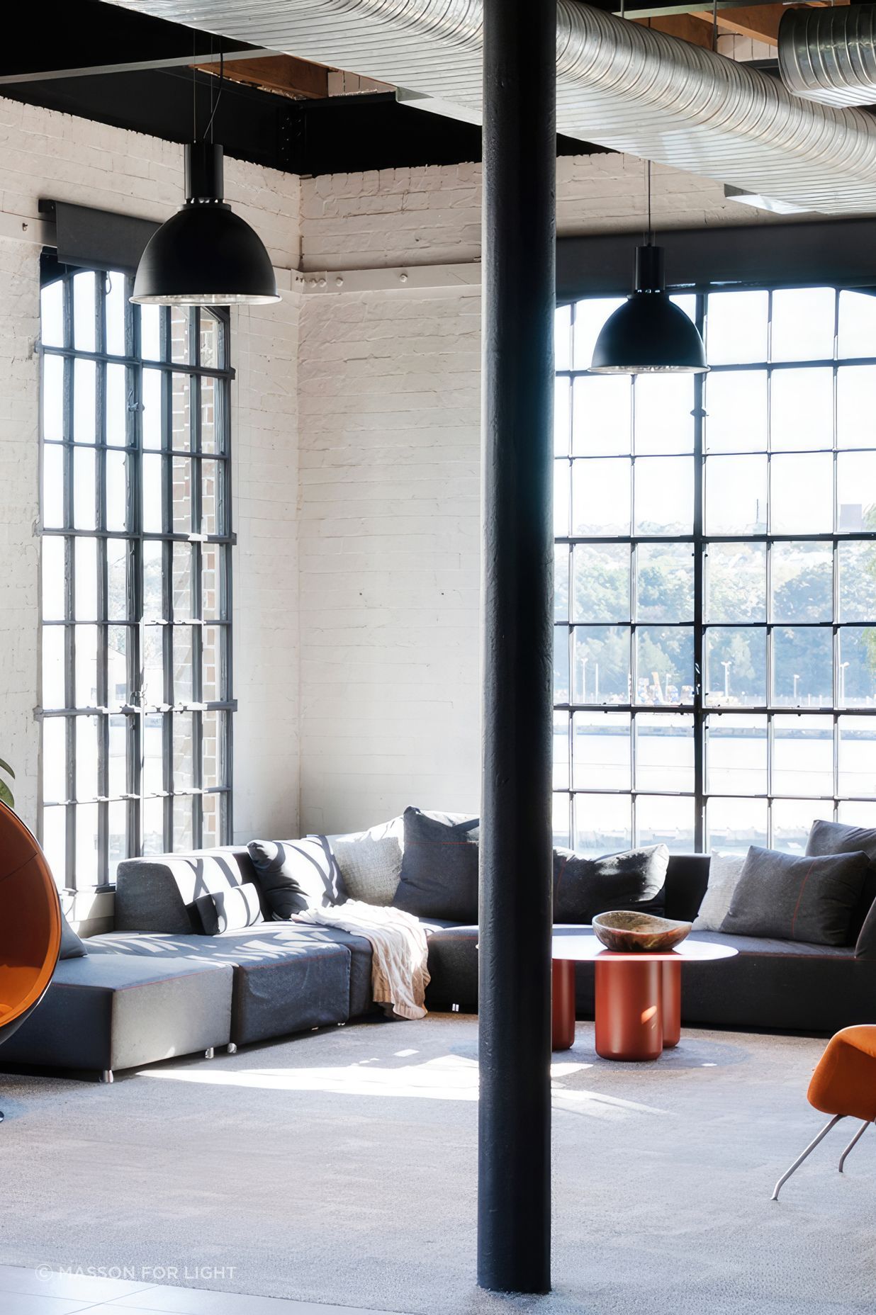Feature lighting to create zones within the office.