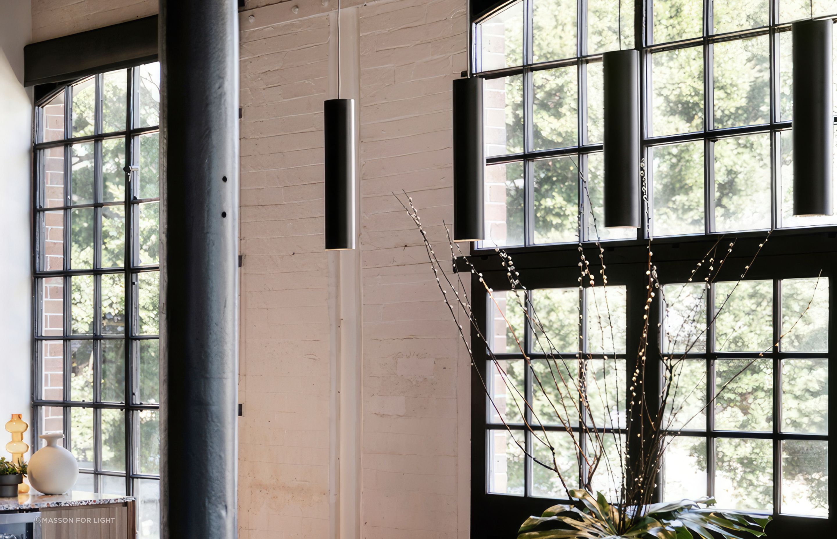 Black pendants mimic nearby pillars.
