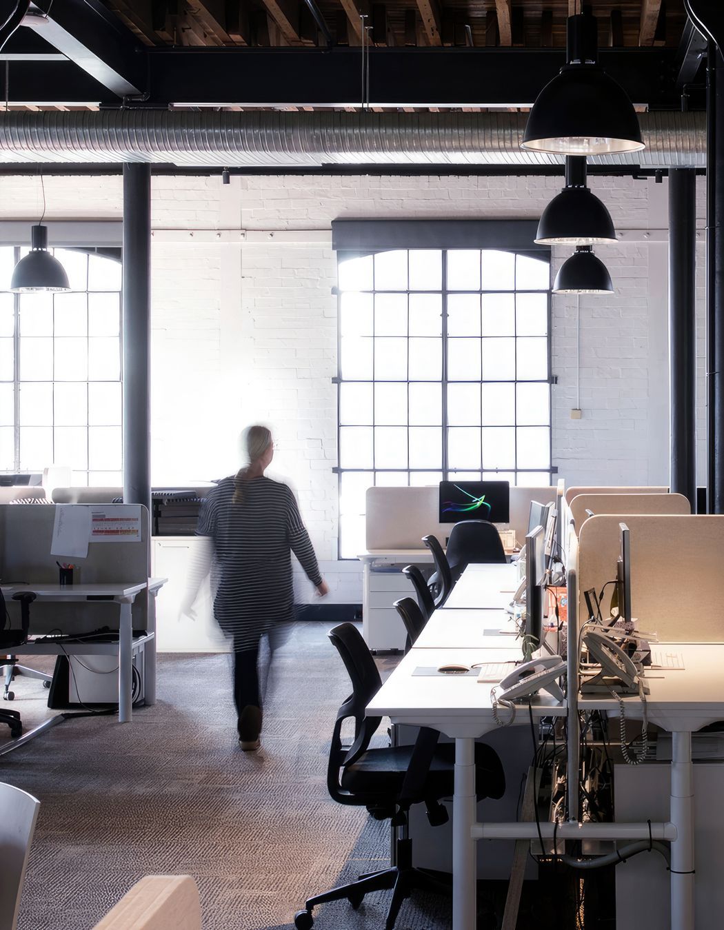 Arena pendants add task lighting.