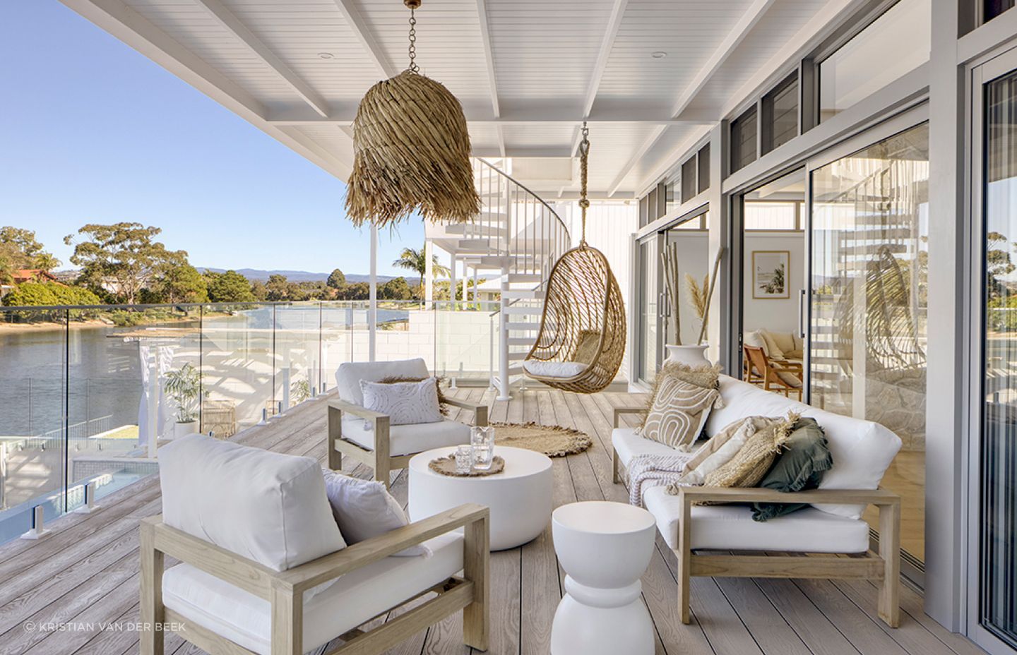 "Selamanya House can be found on the beautiful Burleigh canals, only minutes from Burleigh Beach in the Gold Coast QLD. A simple material palette of weatherboards, stone, timber screens, and large glazing panels all create a luxury coastal feel."